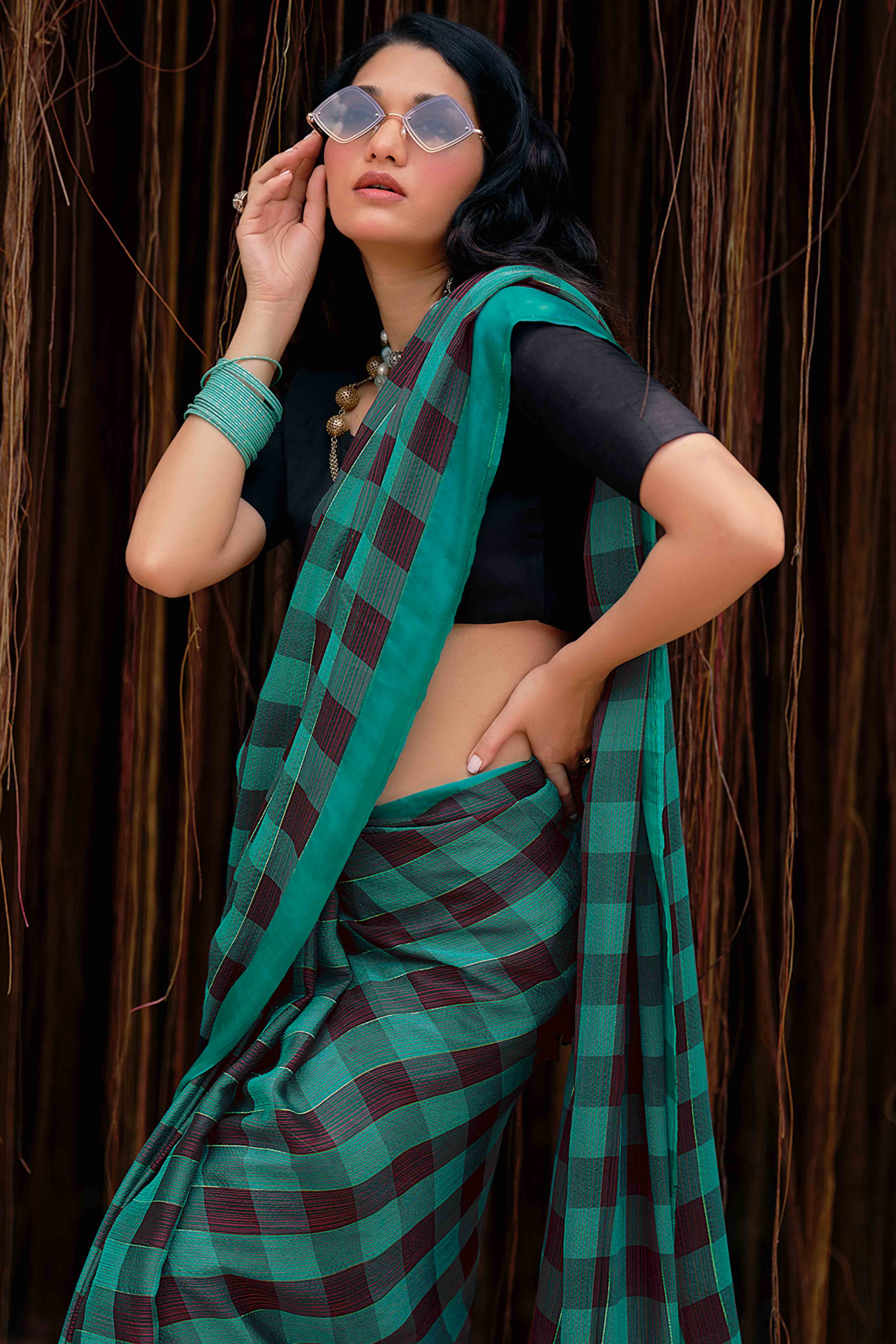 Teal Green With Intricate Black Weaving Checks Georgette Saree