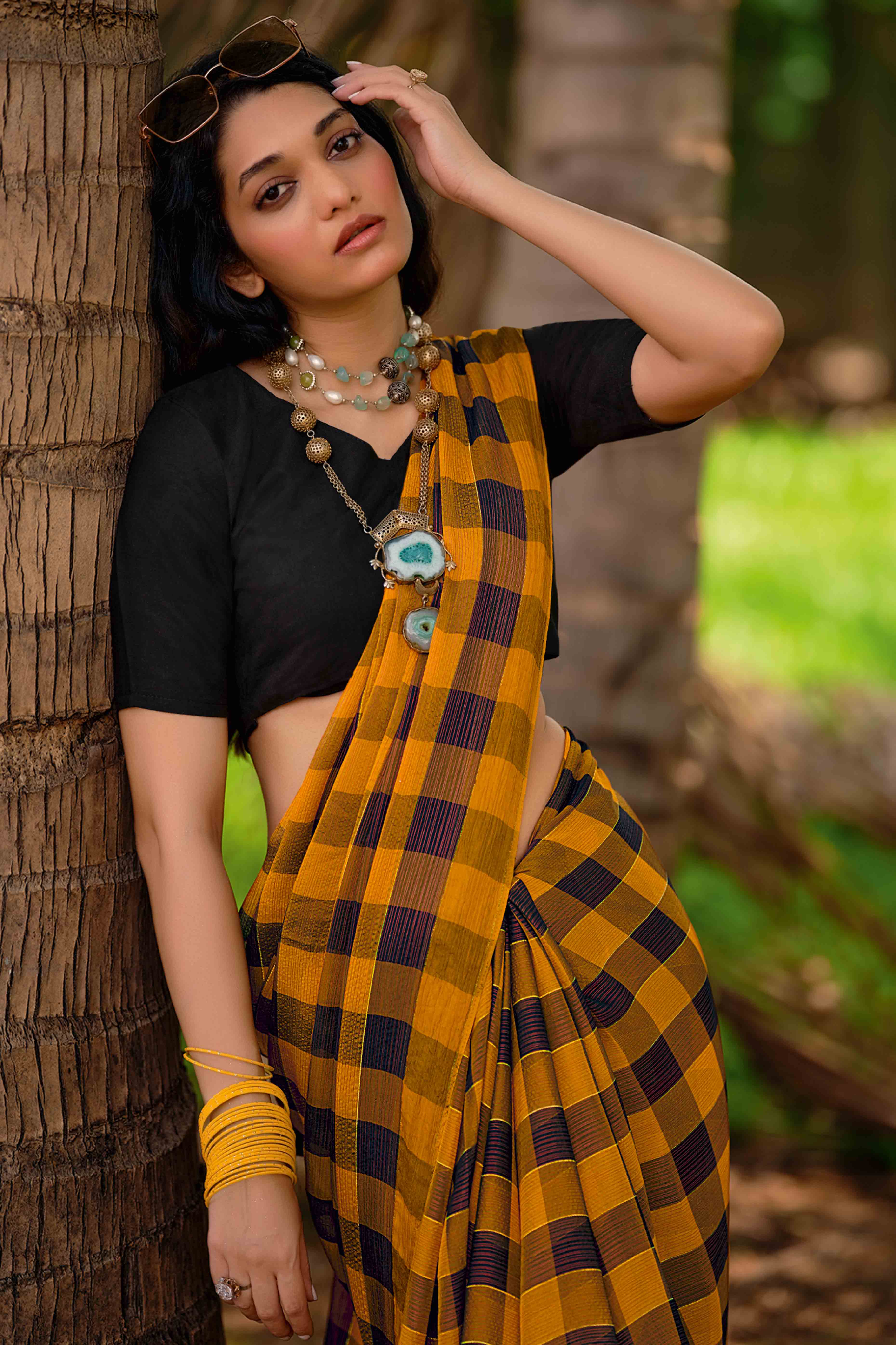 Ochre Orange With Intricate Black Weaving Checks Georgette Saree