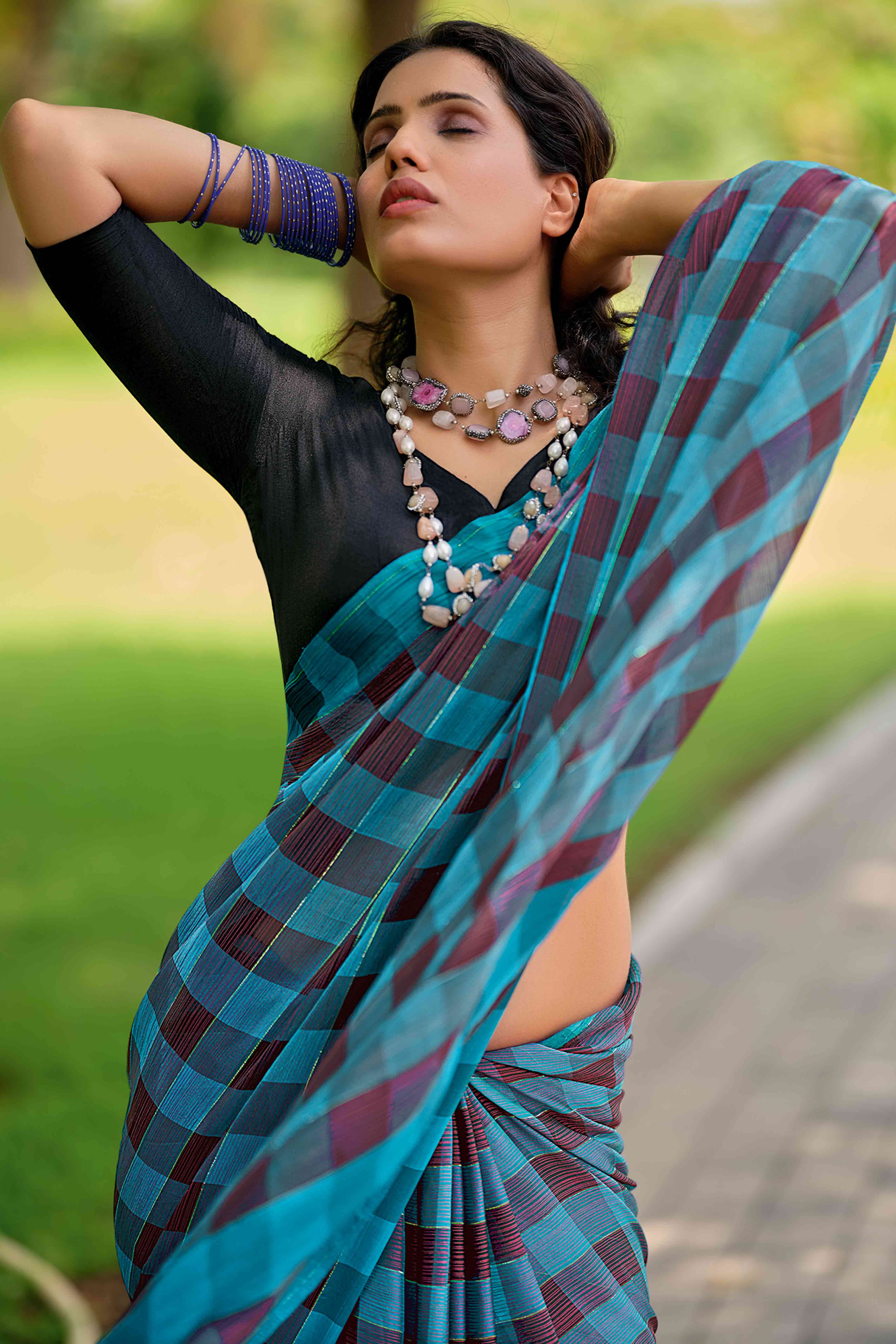 Sky Blue With Intricate Black Weaving Checks Georgette Saree