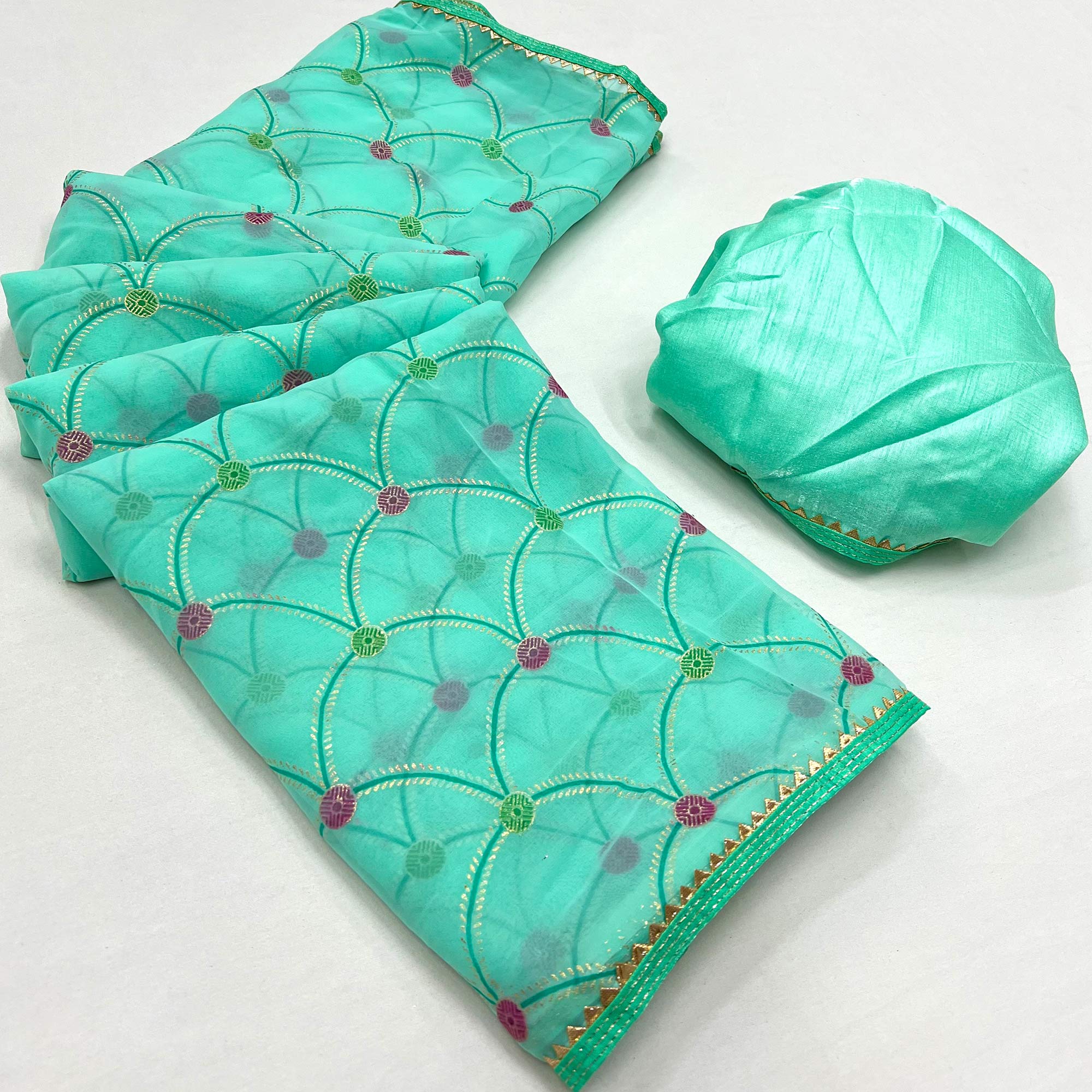 Turquoise Foil Printed Georgette Saree