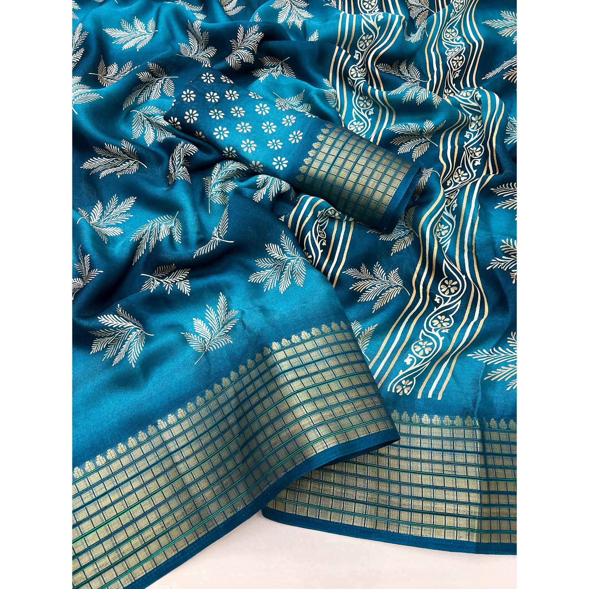 Teal Floral Printed Georgette Saree Featuring Weaving Border Design