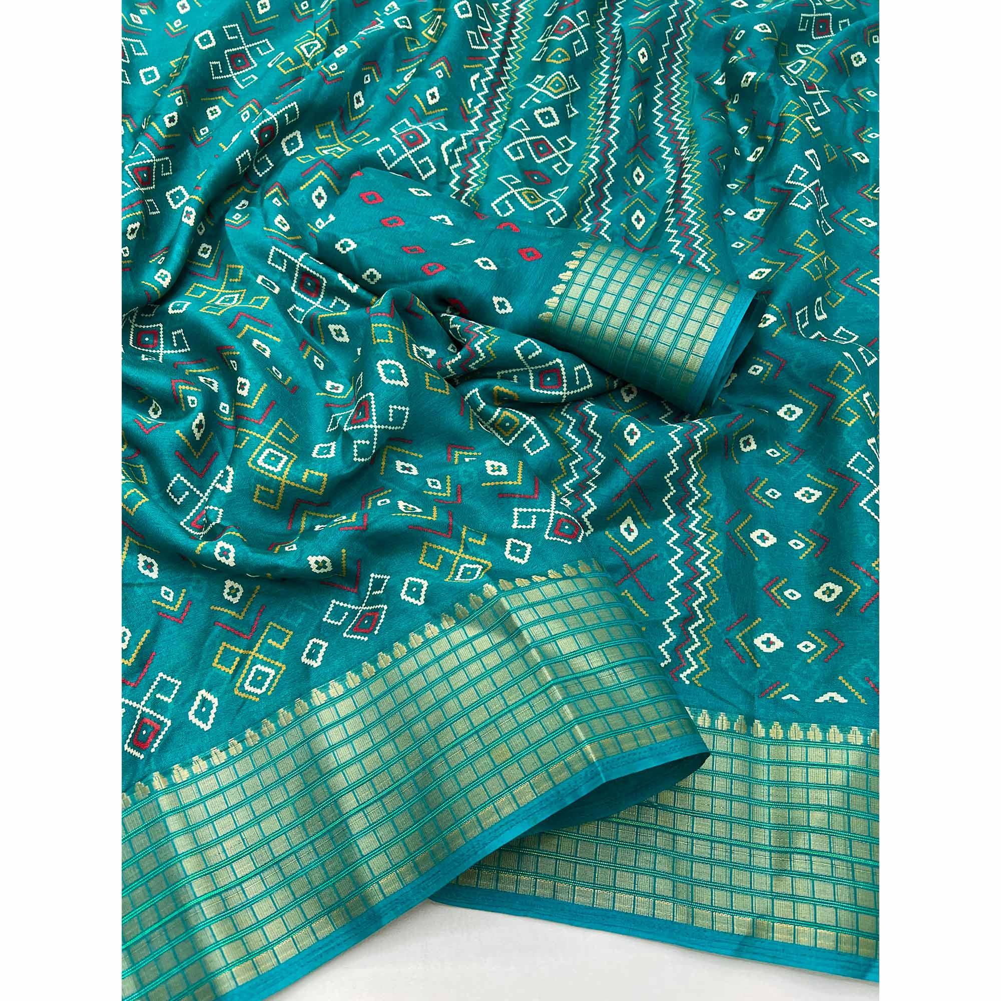 Teal Geometric Patterned Georgette Drape Featuring Zari Border