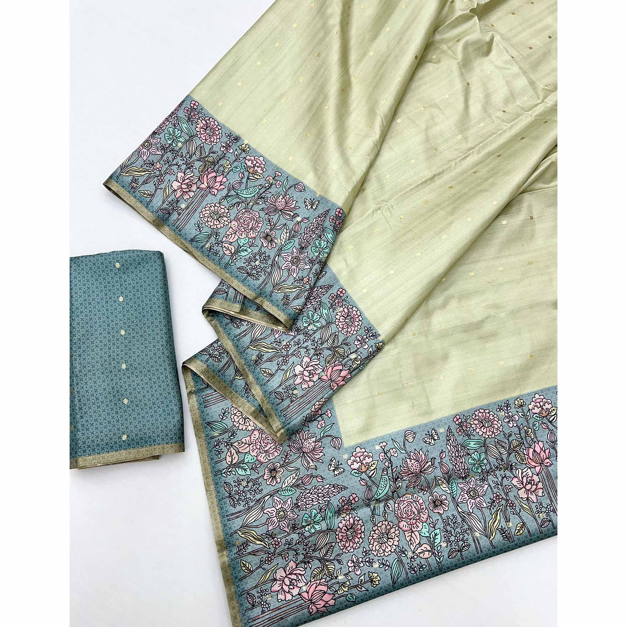 Majestic Chikoo & Teal Silk Blend Saree Enhanced With Floral Prints & Weaving Work