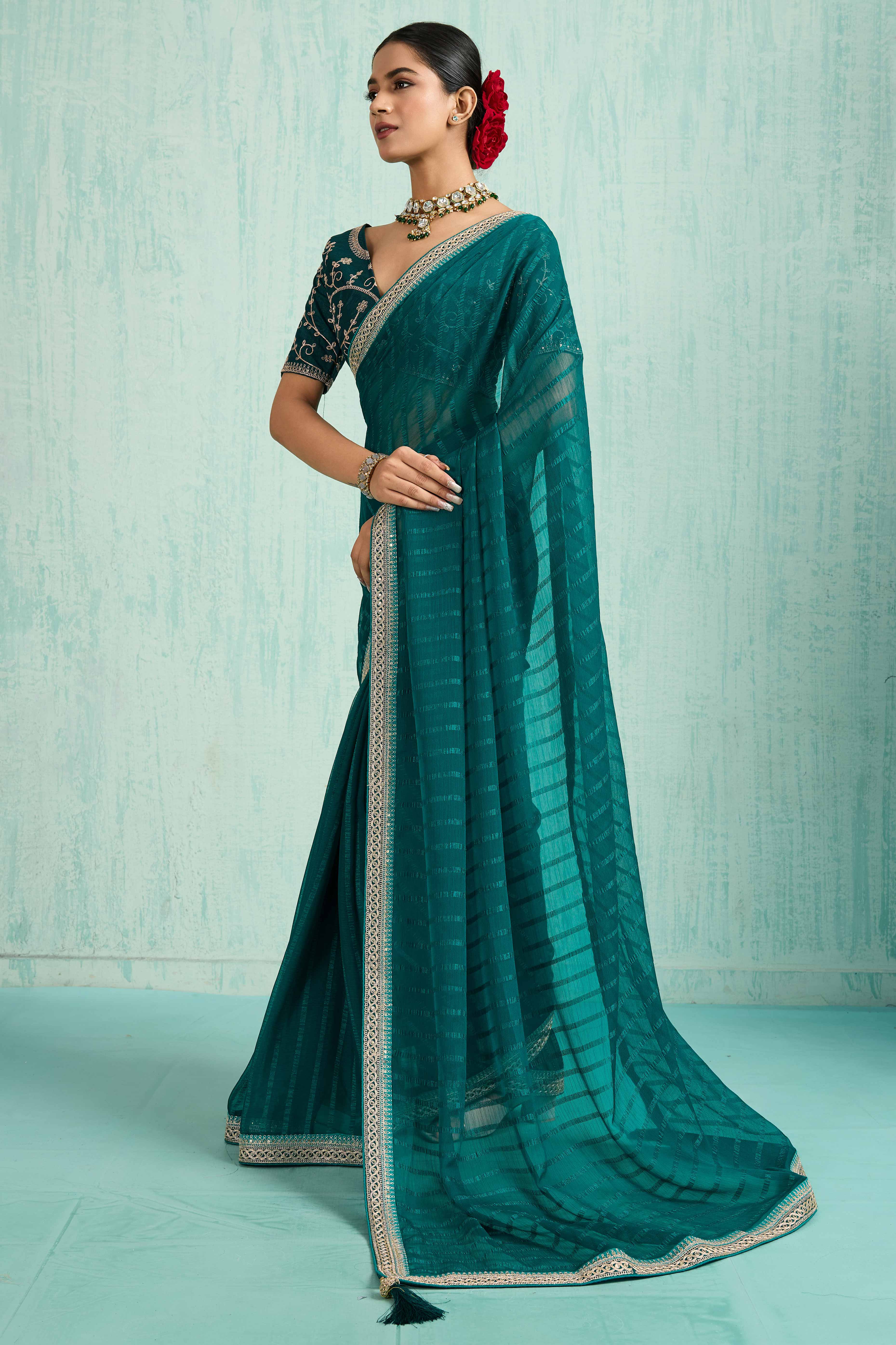 Teal Chiffon Saree With Elegant Stripes & Sequins Embroidered Border