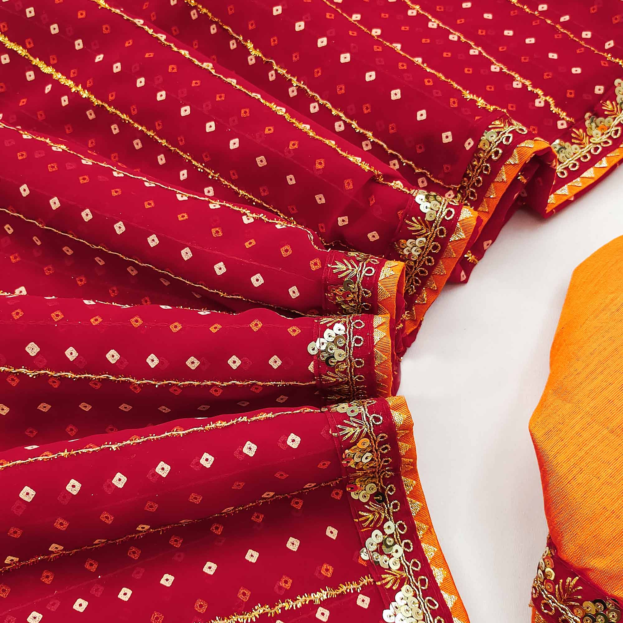 Charming Red Bandhani Printed Georgette Saree With Glittering Sequins & Zari Border