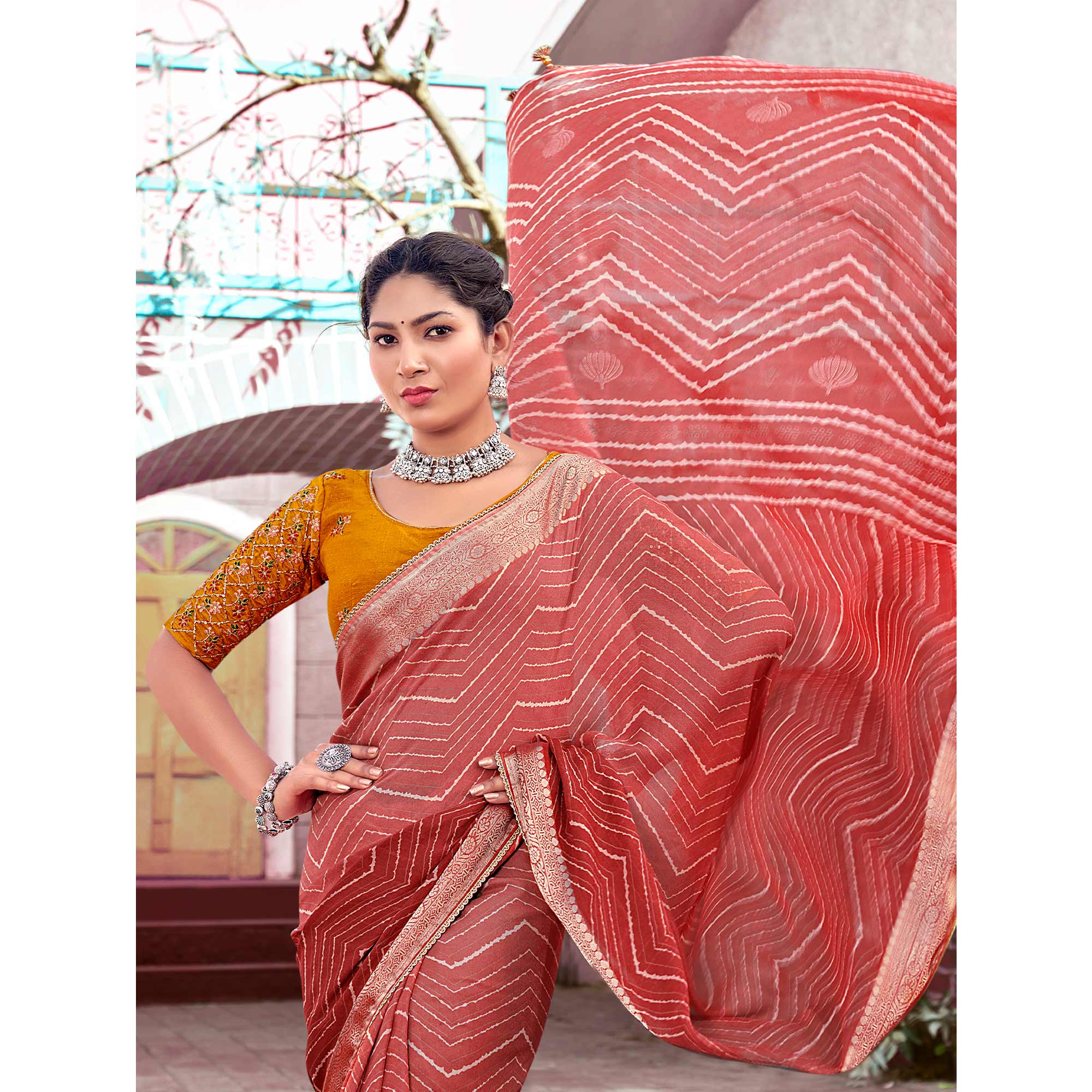 Salmon Pink Leheriya Printed Georgette Saree With Jacquard Border