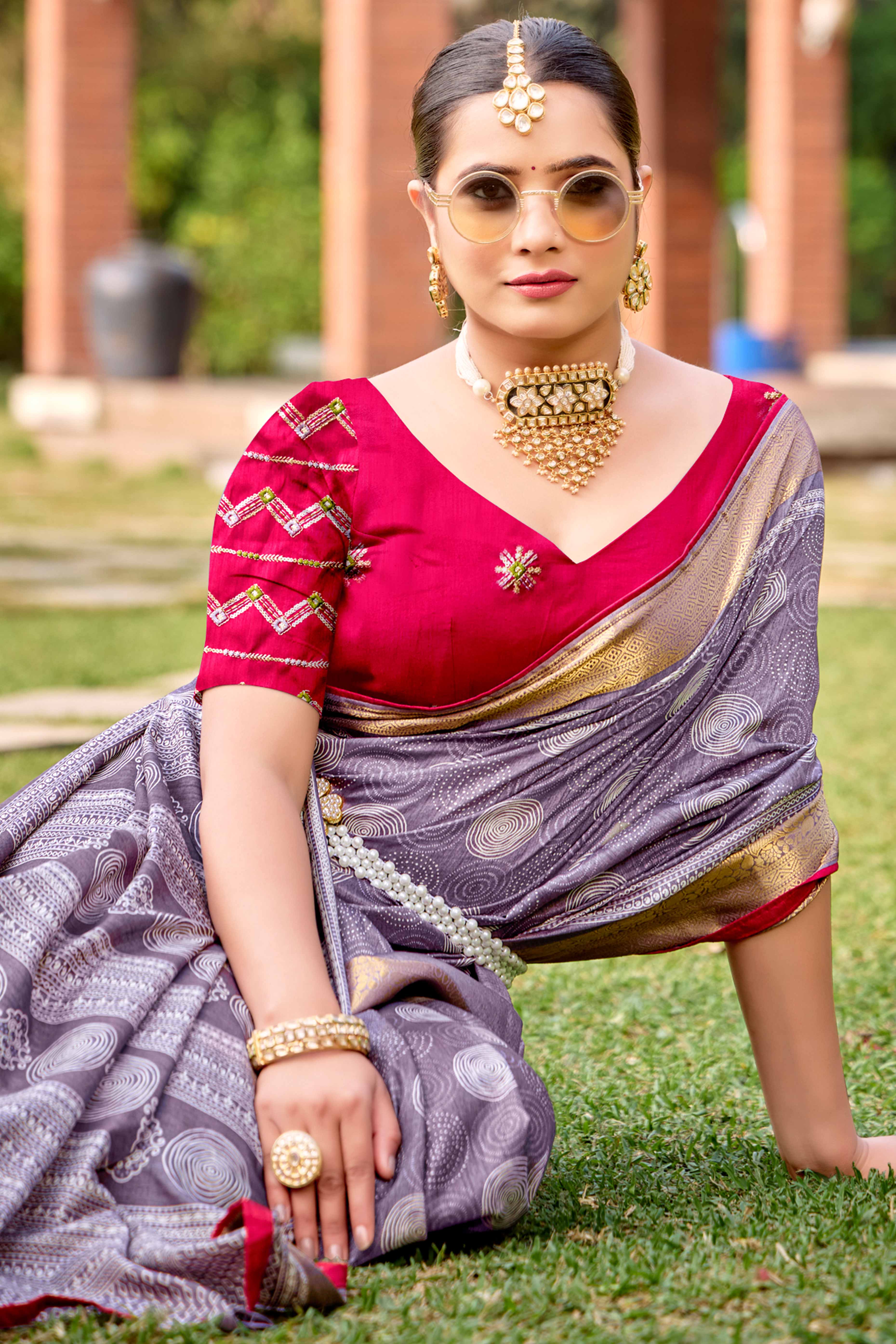 Lavender Printed Dola Silk Saree With Ornate Zari Border & Tassel Pallu