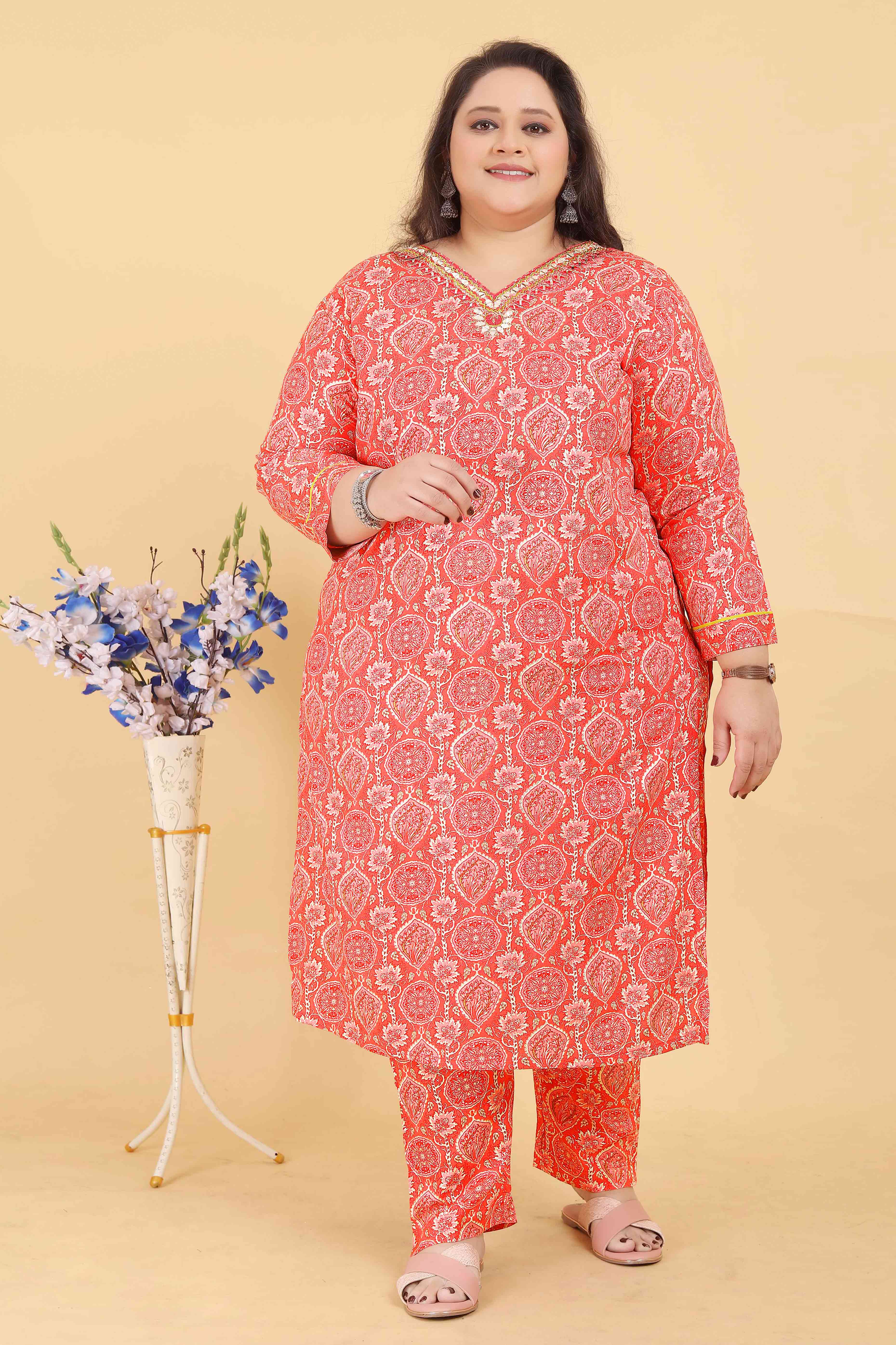 Orange Rayon Straight Salwar Suit Set with Delicate Floral Prints & Side Pockets