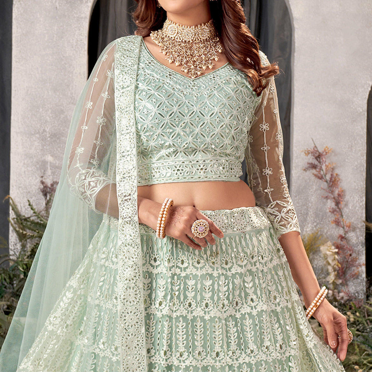 Green Floral Sequins Embroidered Net Lehenga Choli
