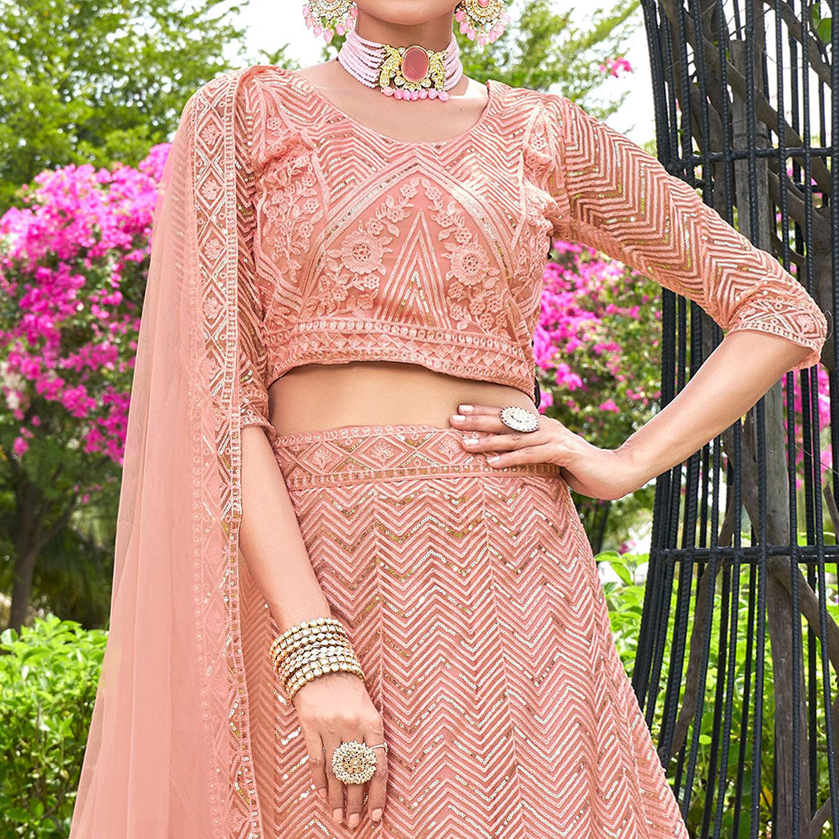 Peach Sequins Floral Embroidered Net Semi Stitched Lehenga Choli