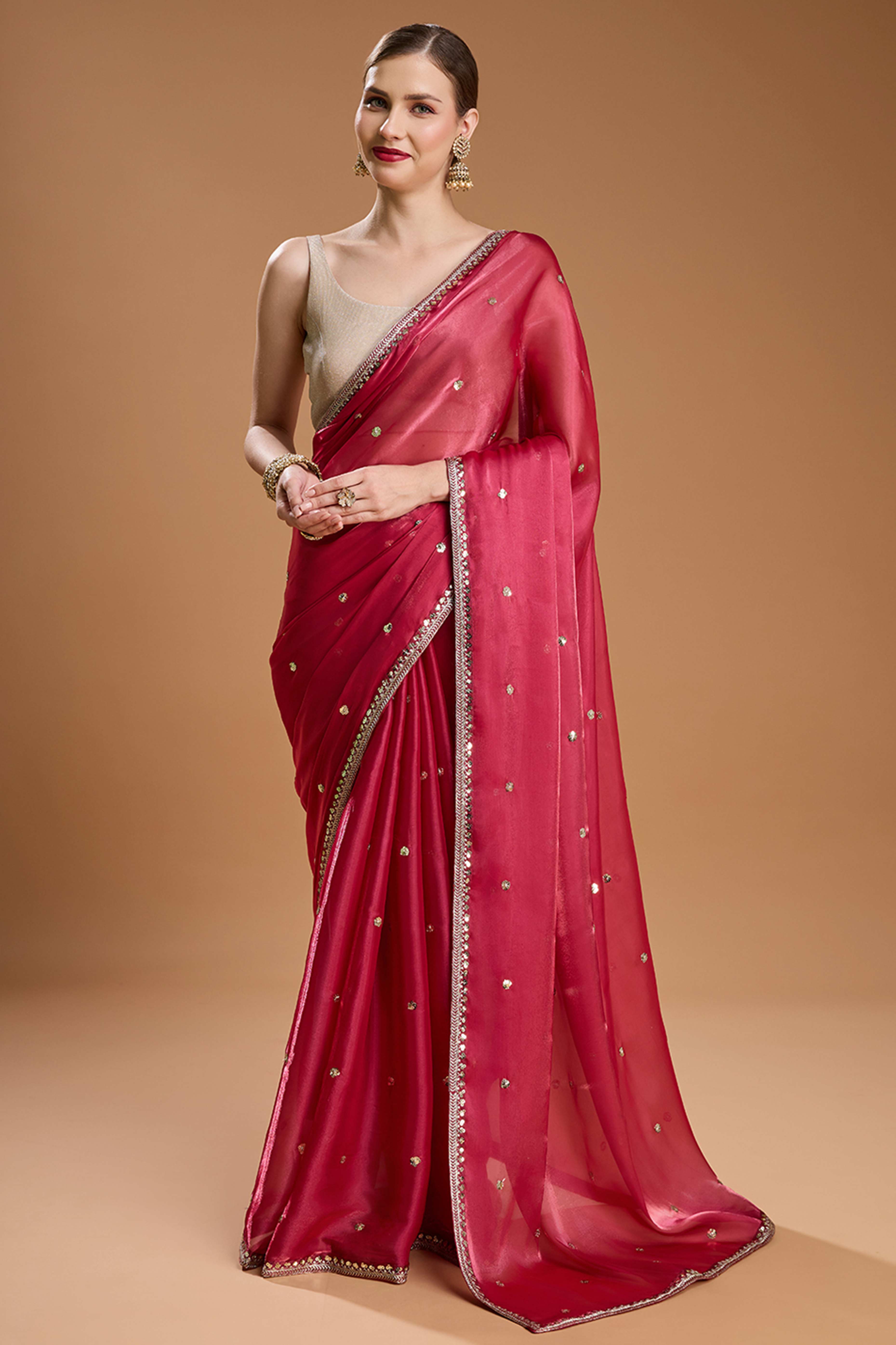 Pink Organza Saree Enhanced with Elegant Sequins Embellishments