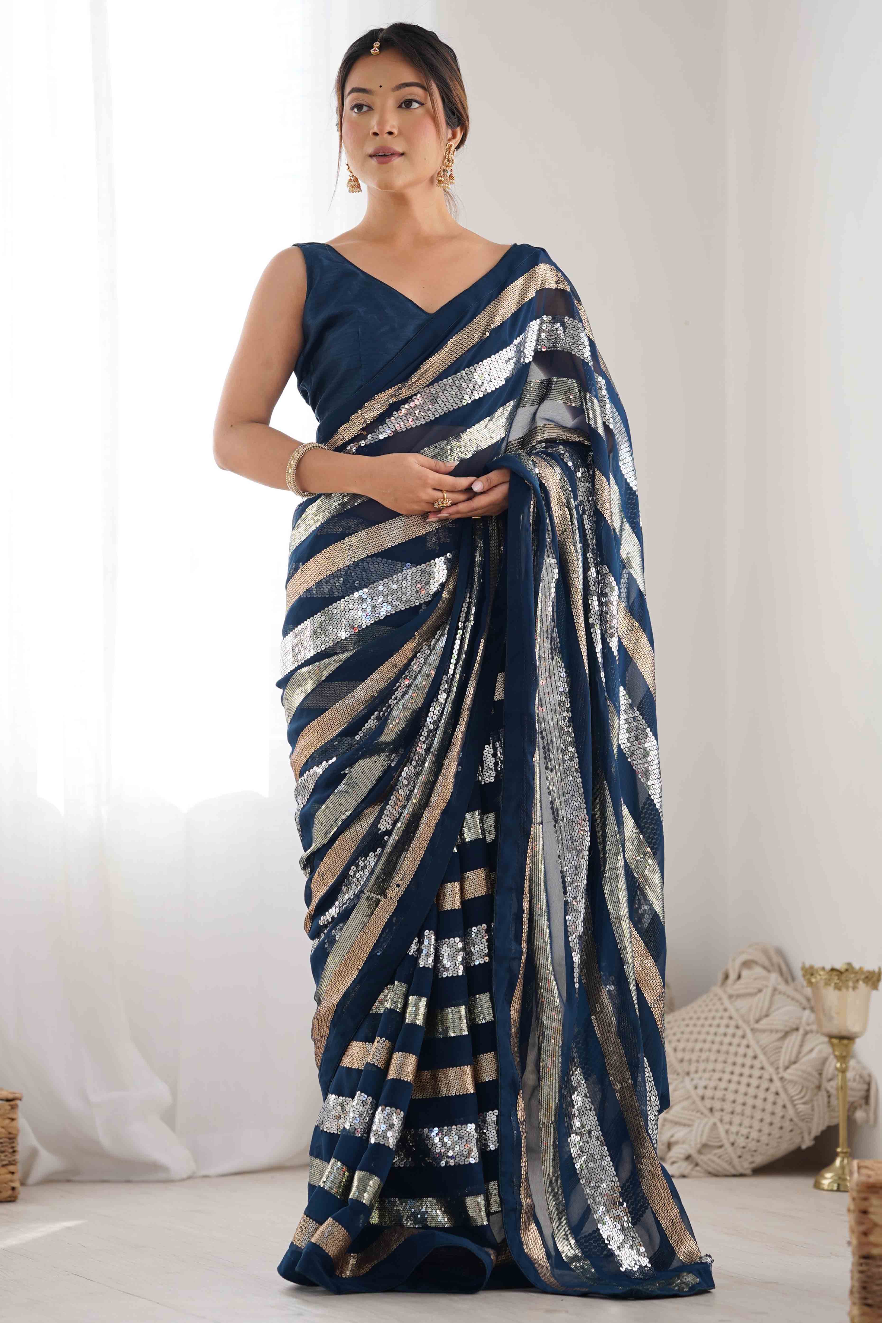 Teal Sequins Embroidered Georgette Saree