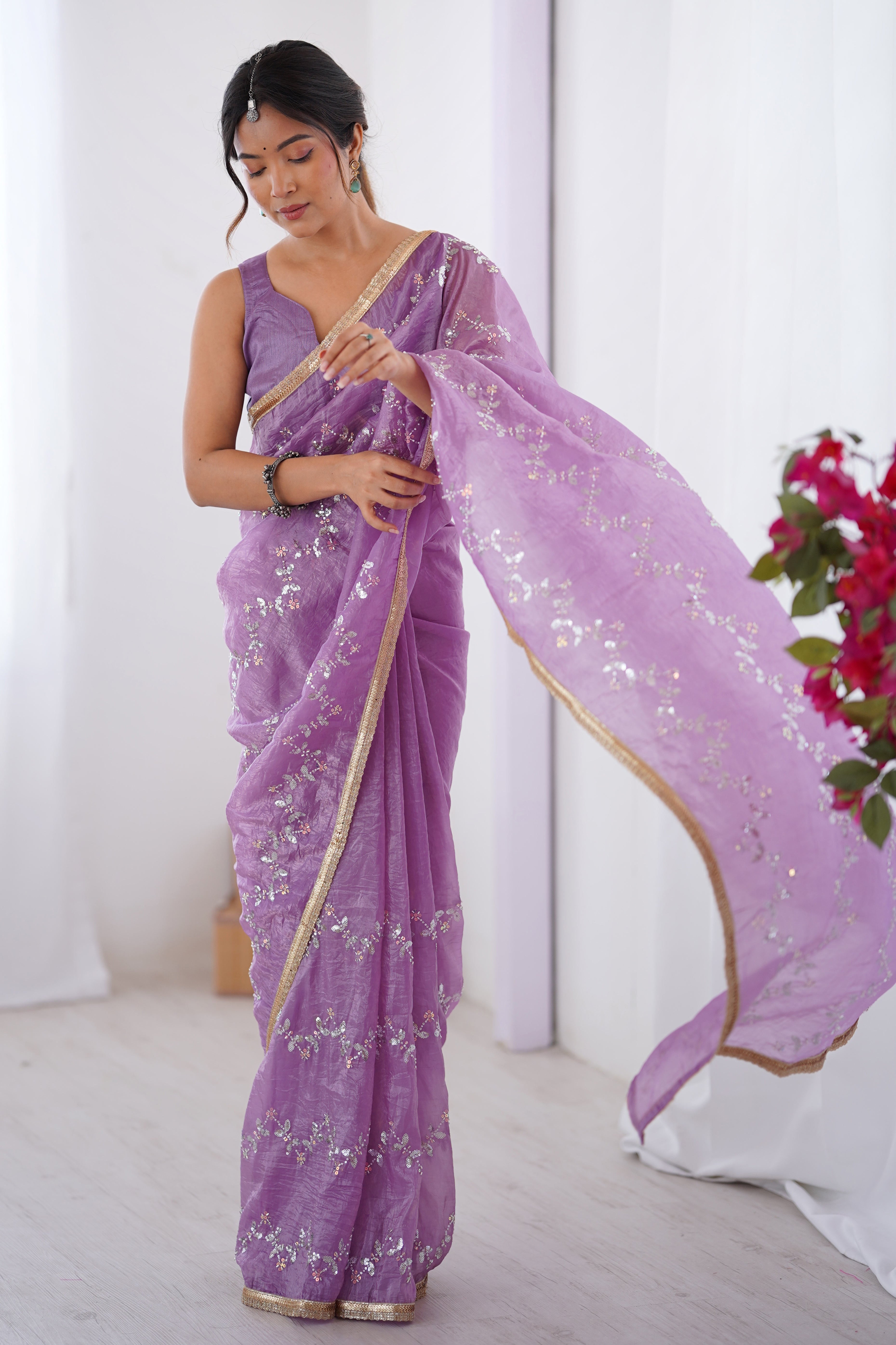 Dazzling Lavender Organza Saree Accented with Sequin, Bead & Stone Work and Delicate Lace Detailing