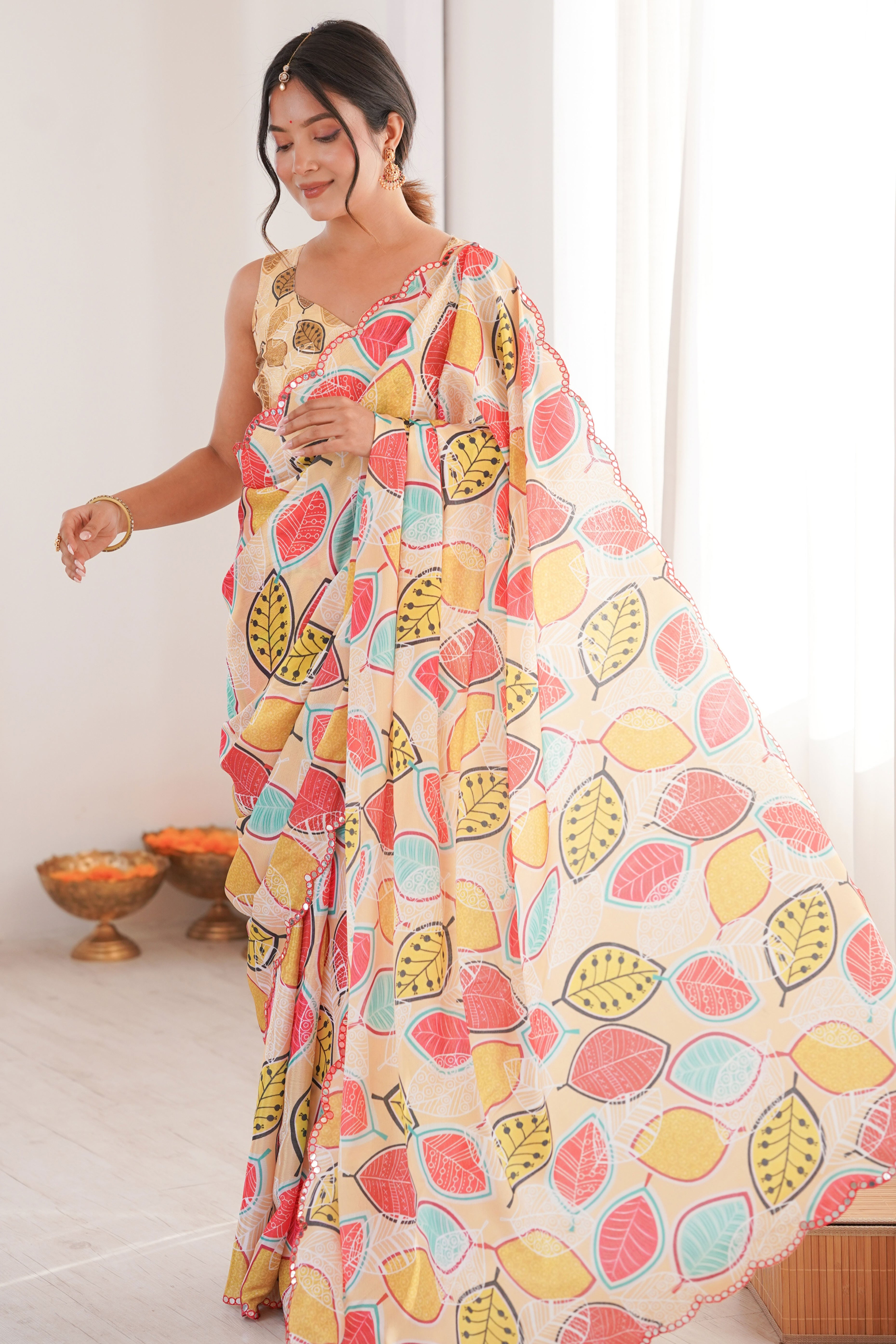 Sophisticated Light Yellow Leaf Digital Printed Chinon Saree Highlighted By Embroidered Border