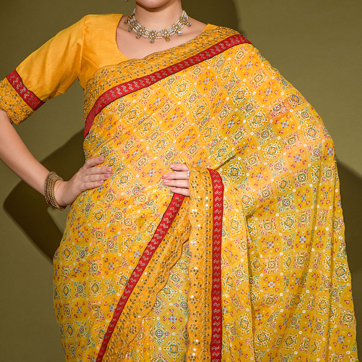 Yellow Patola Foil Printed Georgette Saree with Embroidered Border