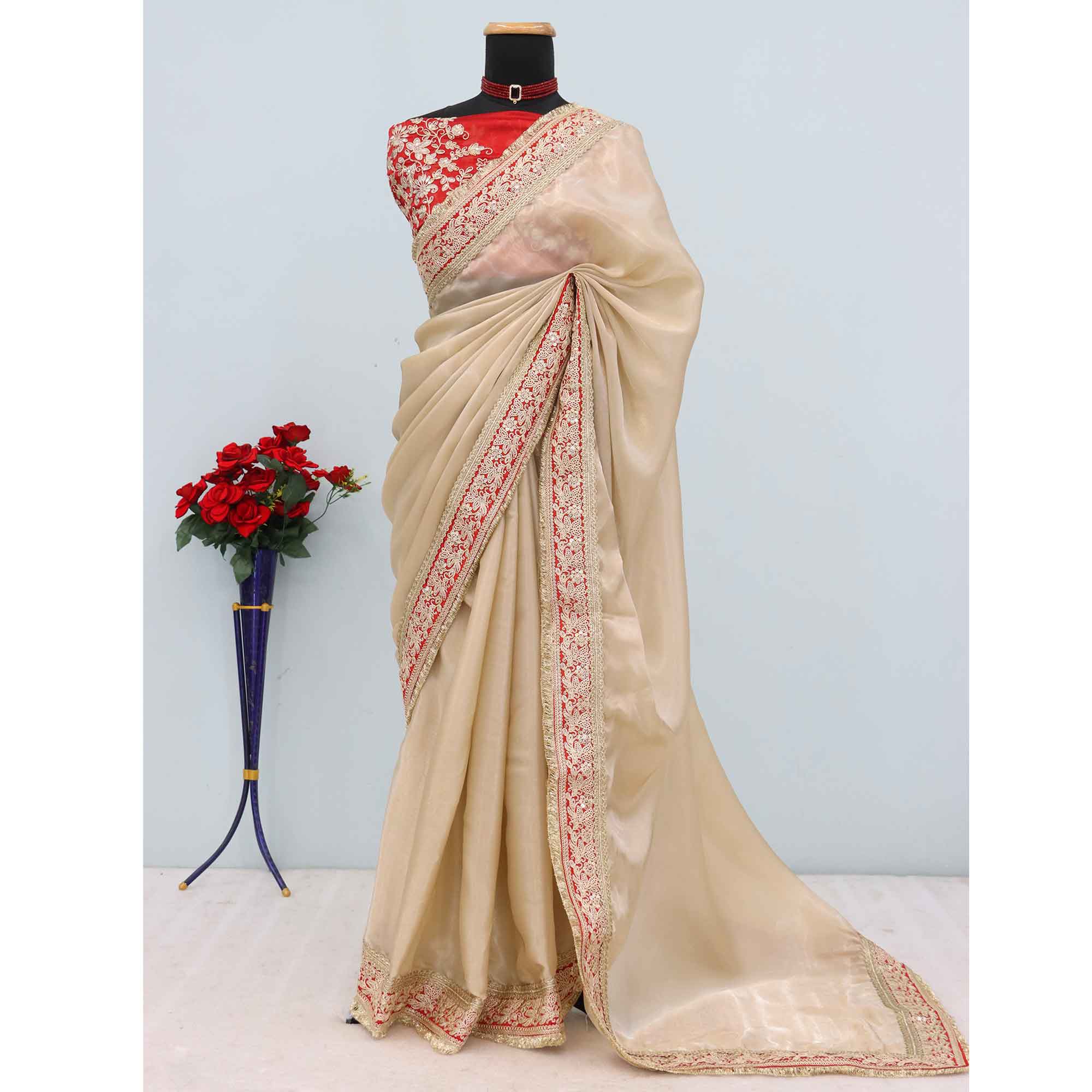 Cream Fancy Satin Solid Saree Accentuated With Elegant Lace Work