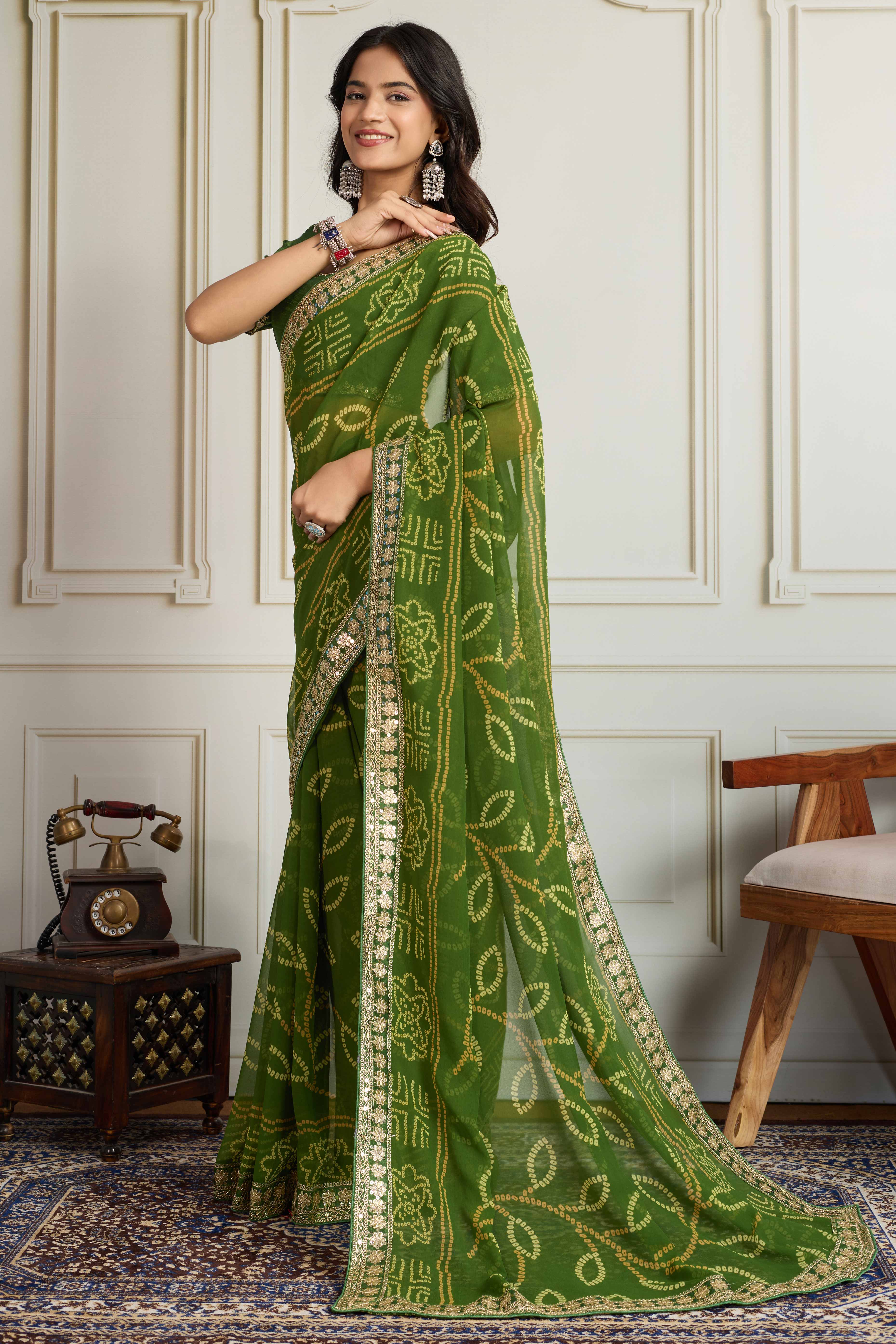 Green Bandhani Digital Printed Georgette Saree Enhanced With Cording Embroidered Border