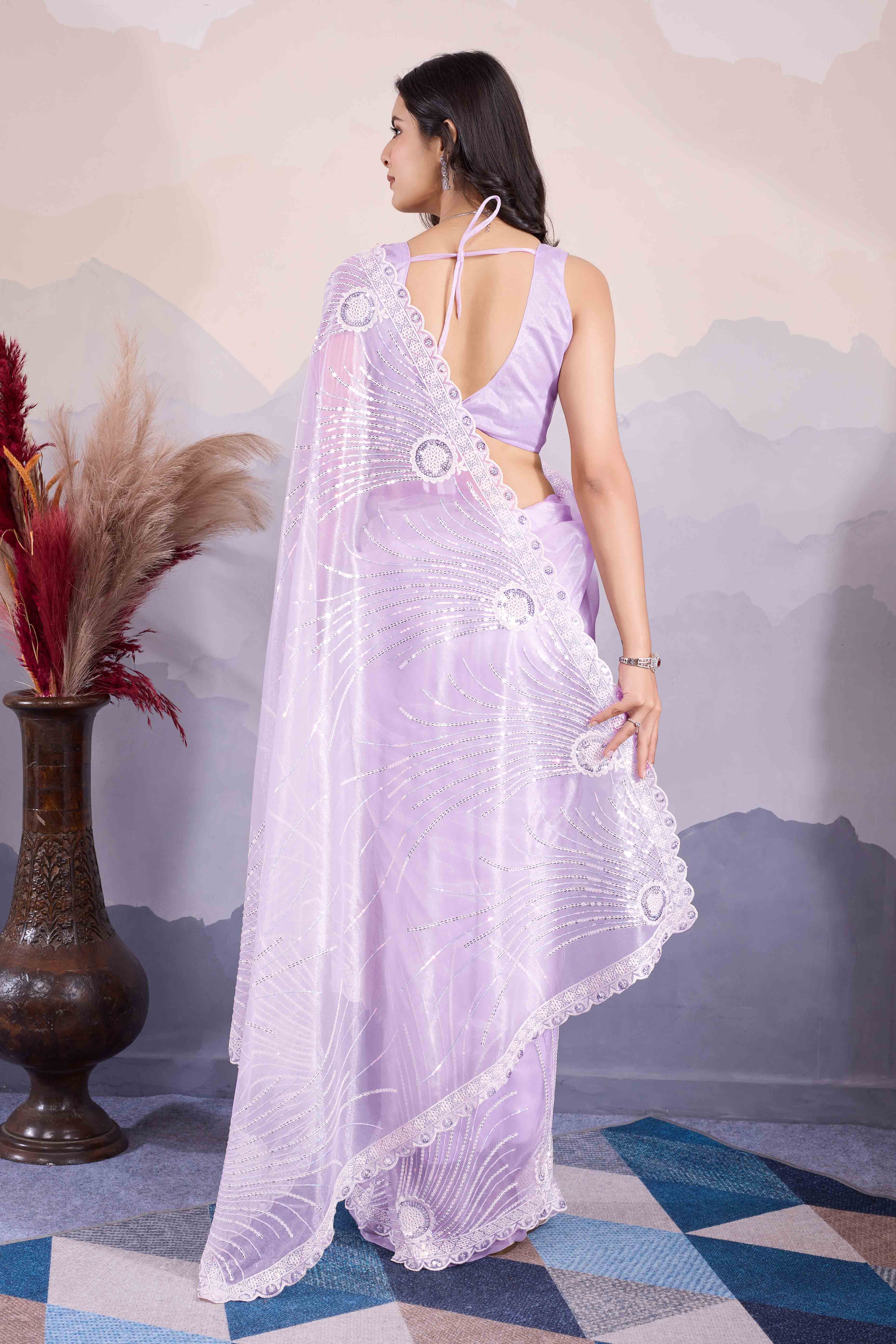 Lavender Sequins Embroidered Twill Net Saree