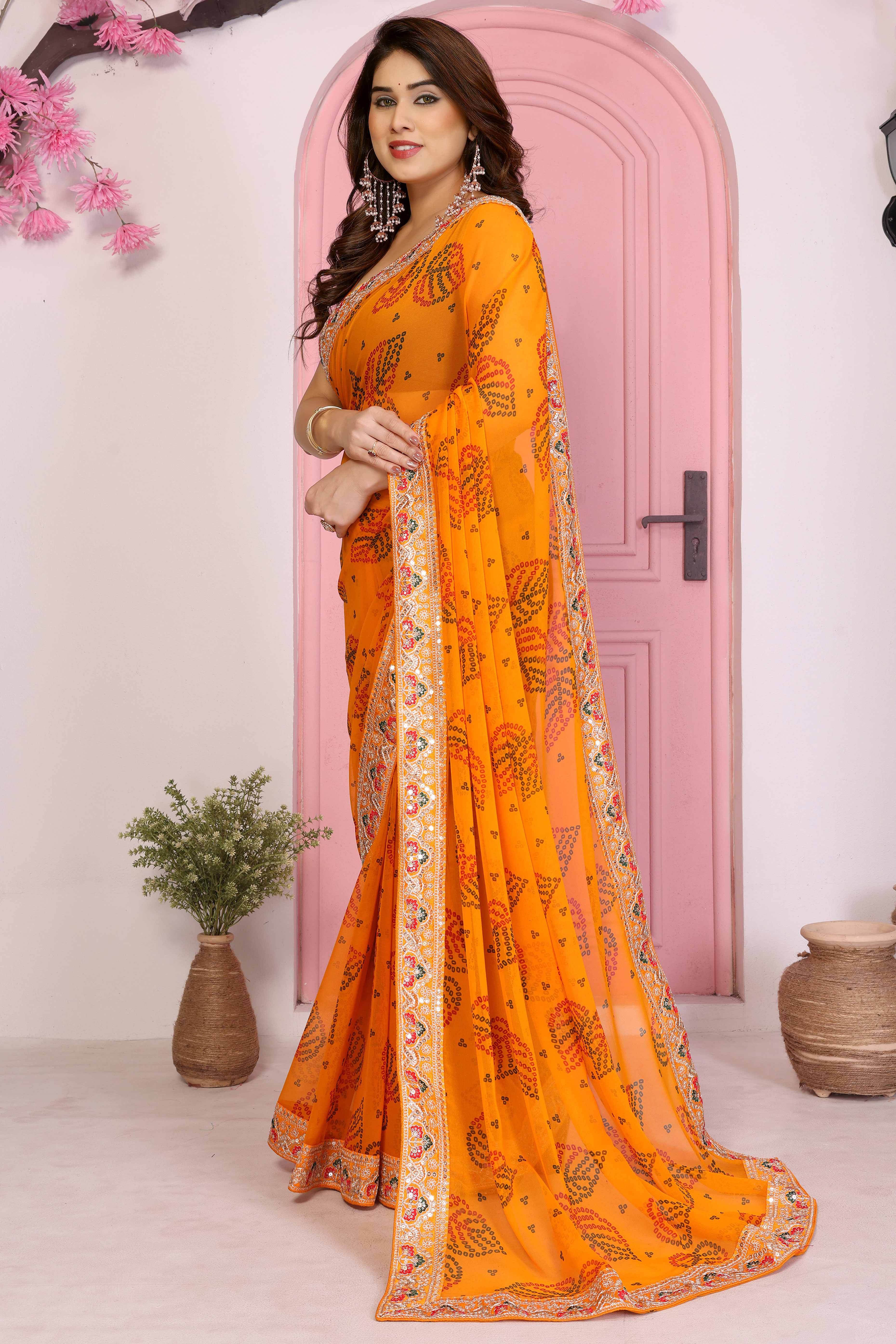Mustard Georgette Saree with Traditional Bandhani Print and Lace Accents