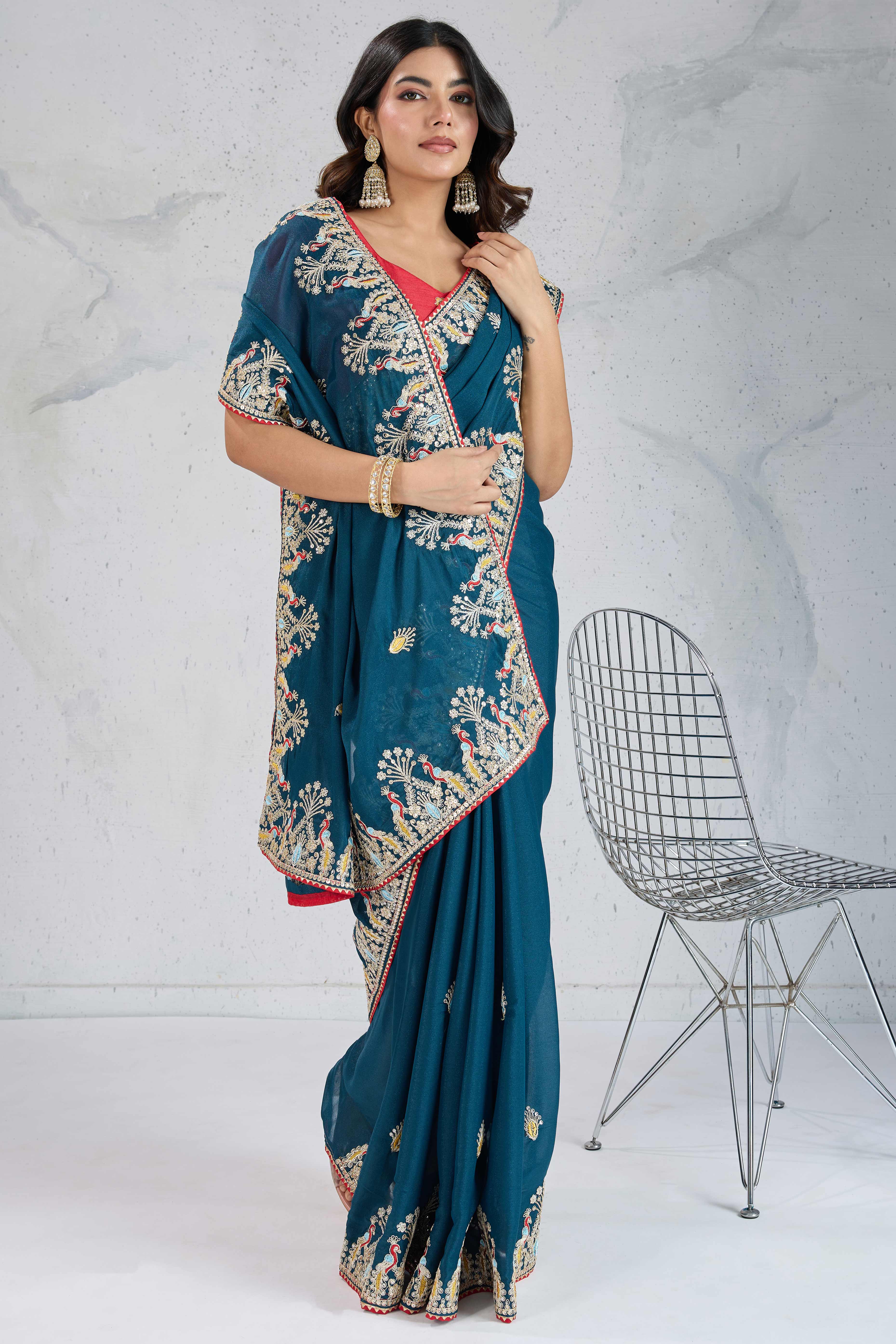 Teal Embroidered Saree with Ethnic Detailing in Georgette Fabric