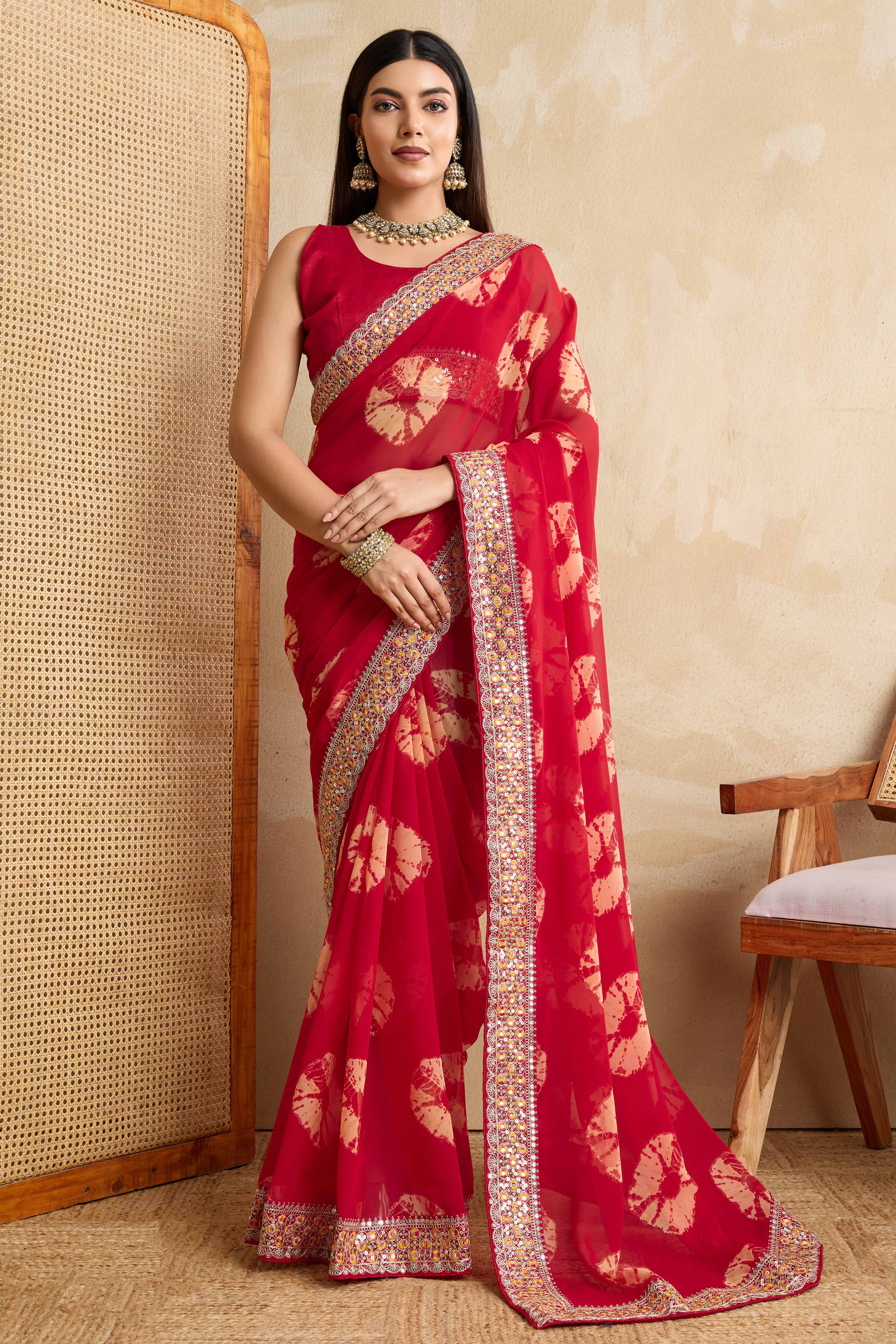 Red Georgette Saree with Contemporary Tie-Dye Patterns and Classic Lace Work Finish