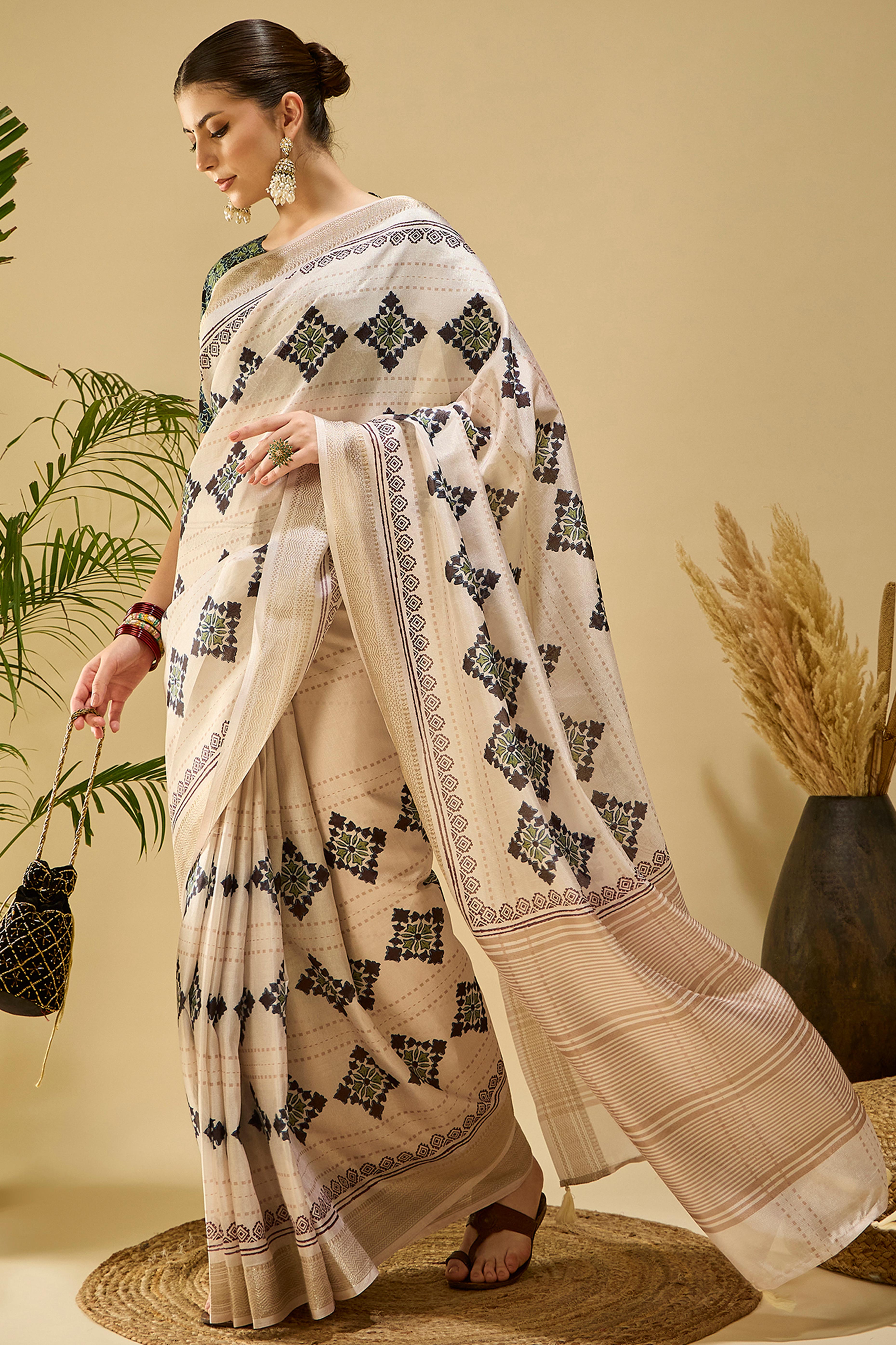 Ivory Cream Floral Printed Katki Cotton Silk Saree With Graceful Tassel Pallu