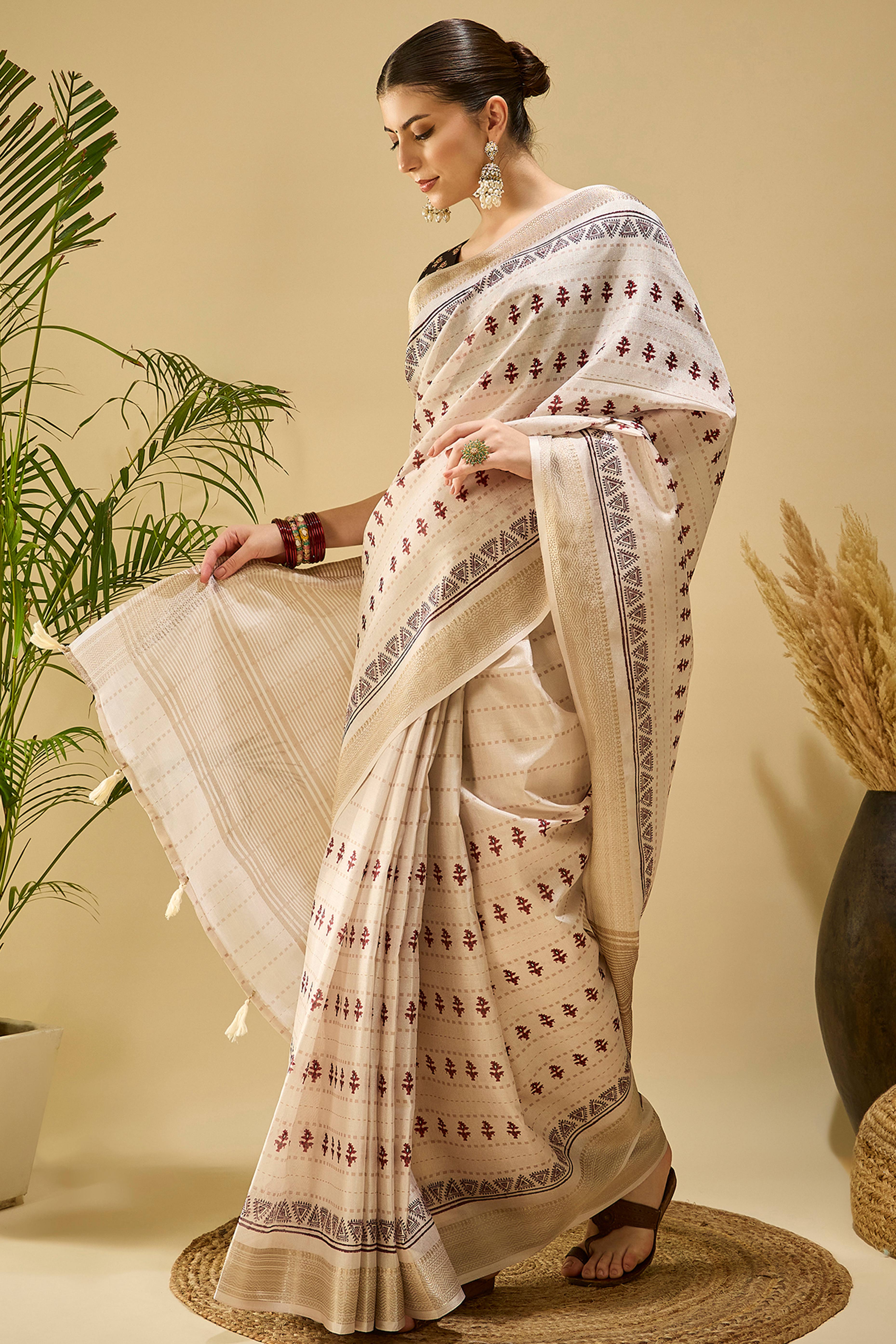Elegant Cream Katki Cotton Silk Saree With Delicate Floral Prints & Tassel Pallu