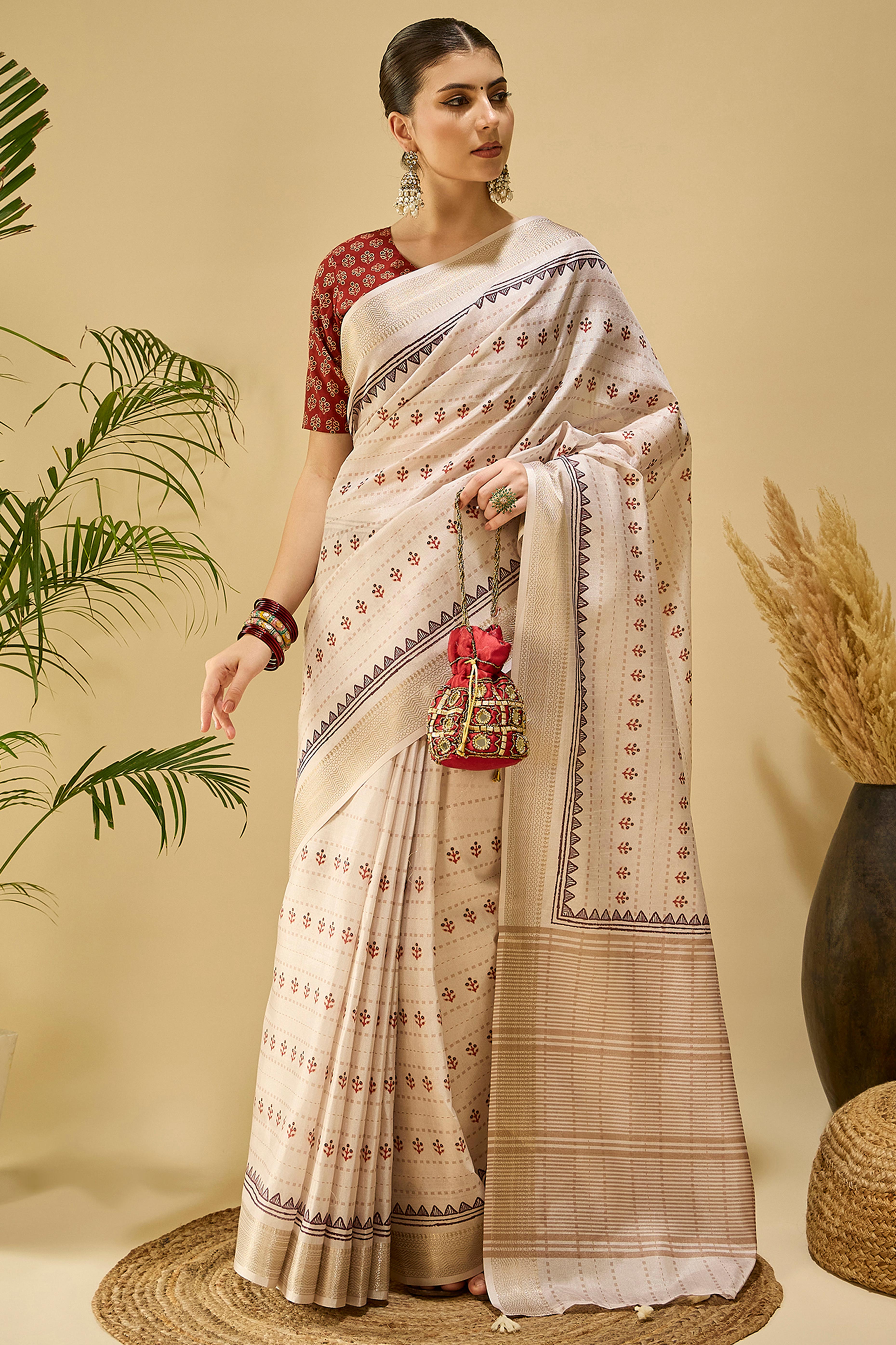 Charming Cream Floral Print Katki Cotton Silk Saree Featuring Stylish Tassel Pallu
