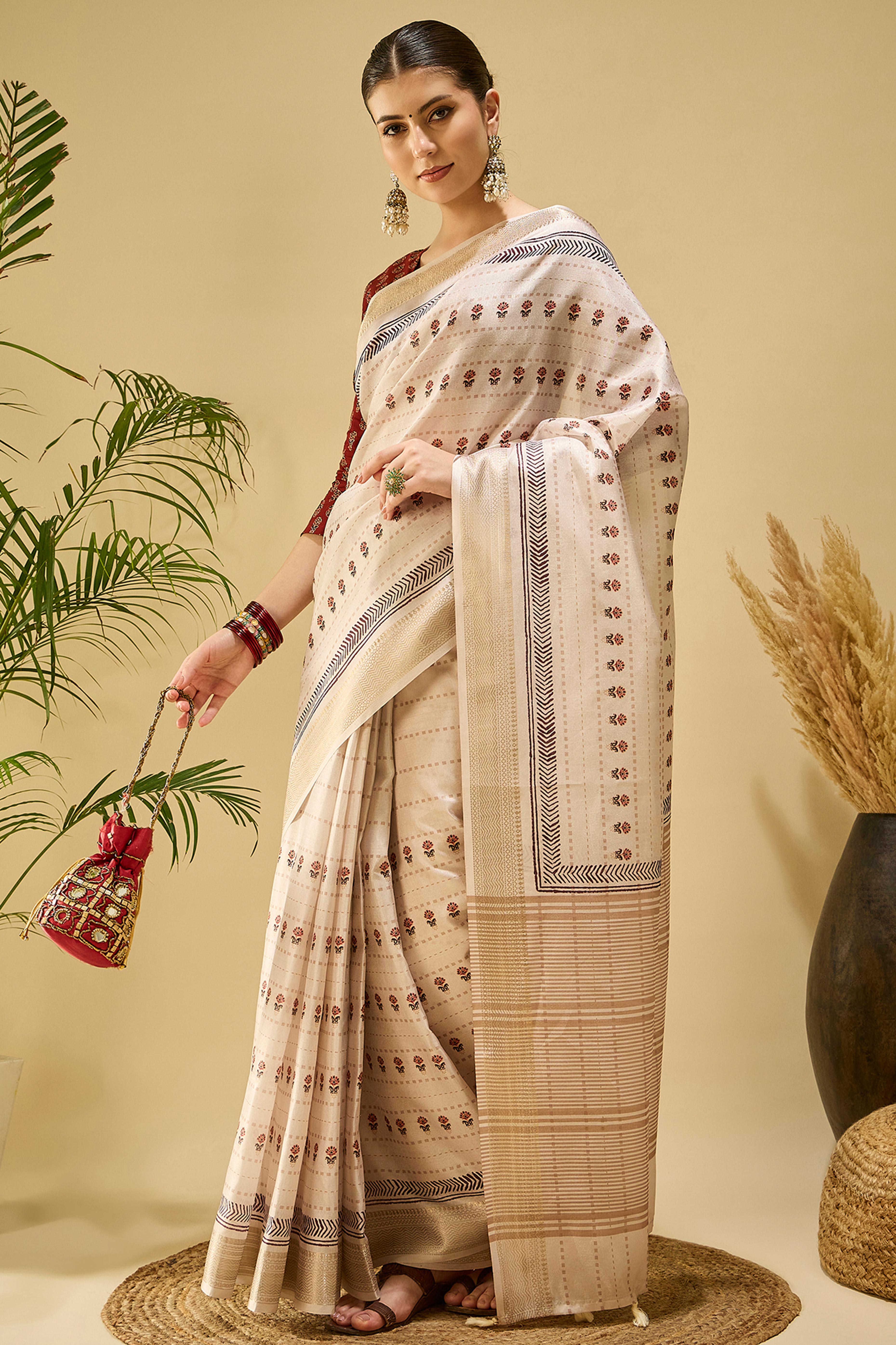 Timeless Cream Katki Cotton Silk Saree With Blooming Floral Prints & Tassel Draped Pallu