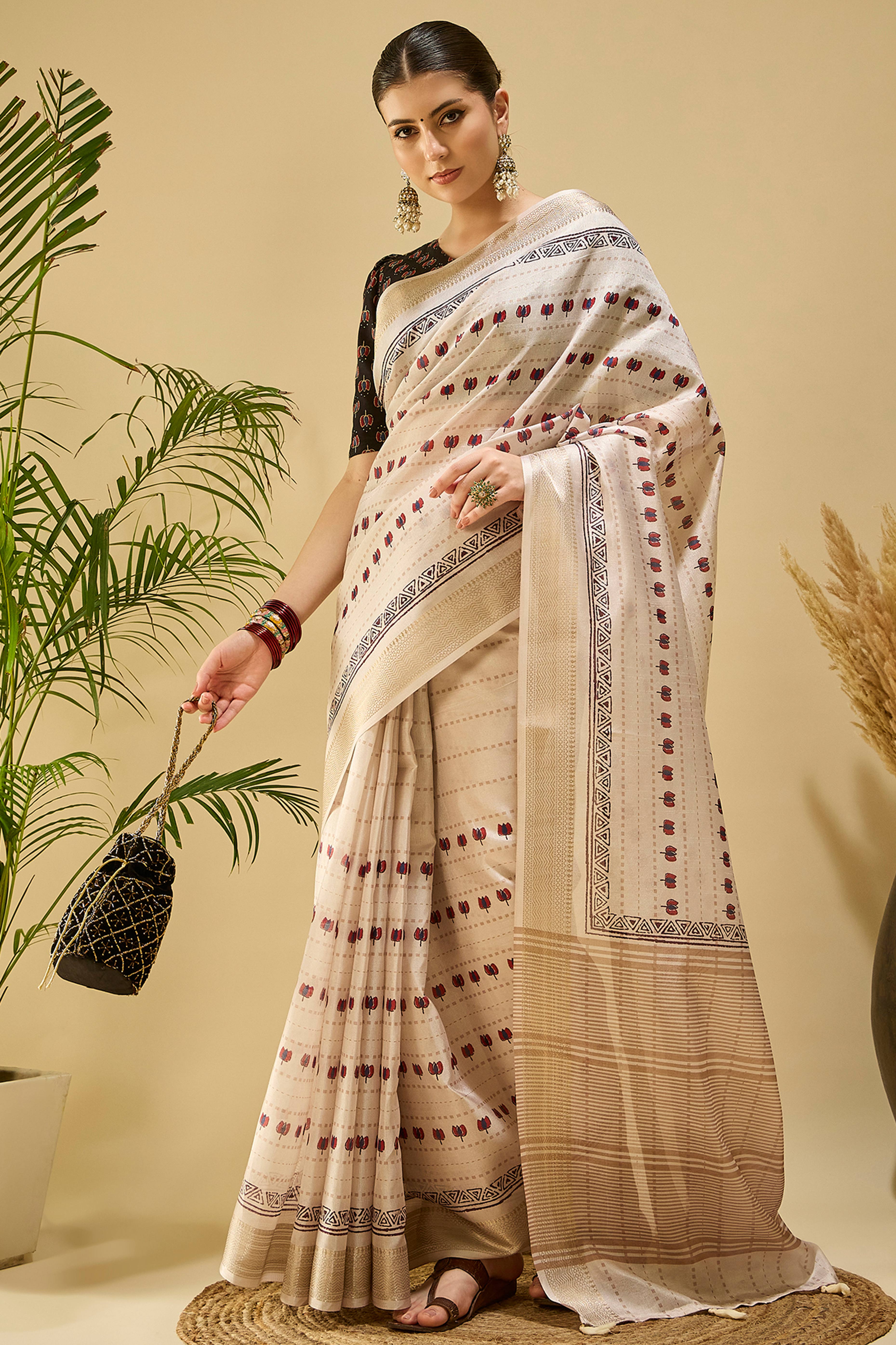 Refined Cream Floral Patterned Katki Cotton Silk Saree Highlighted By Tassel Pallu