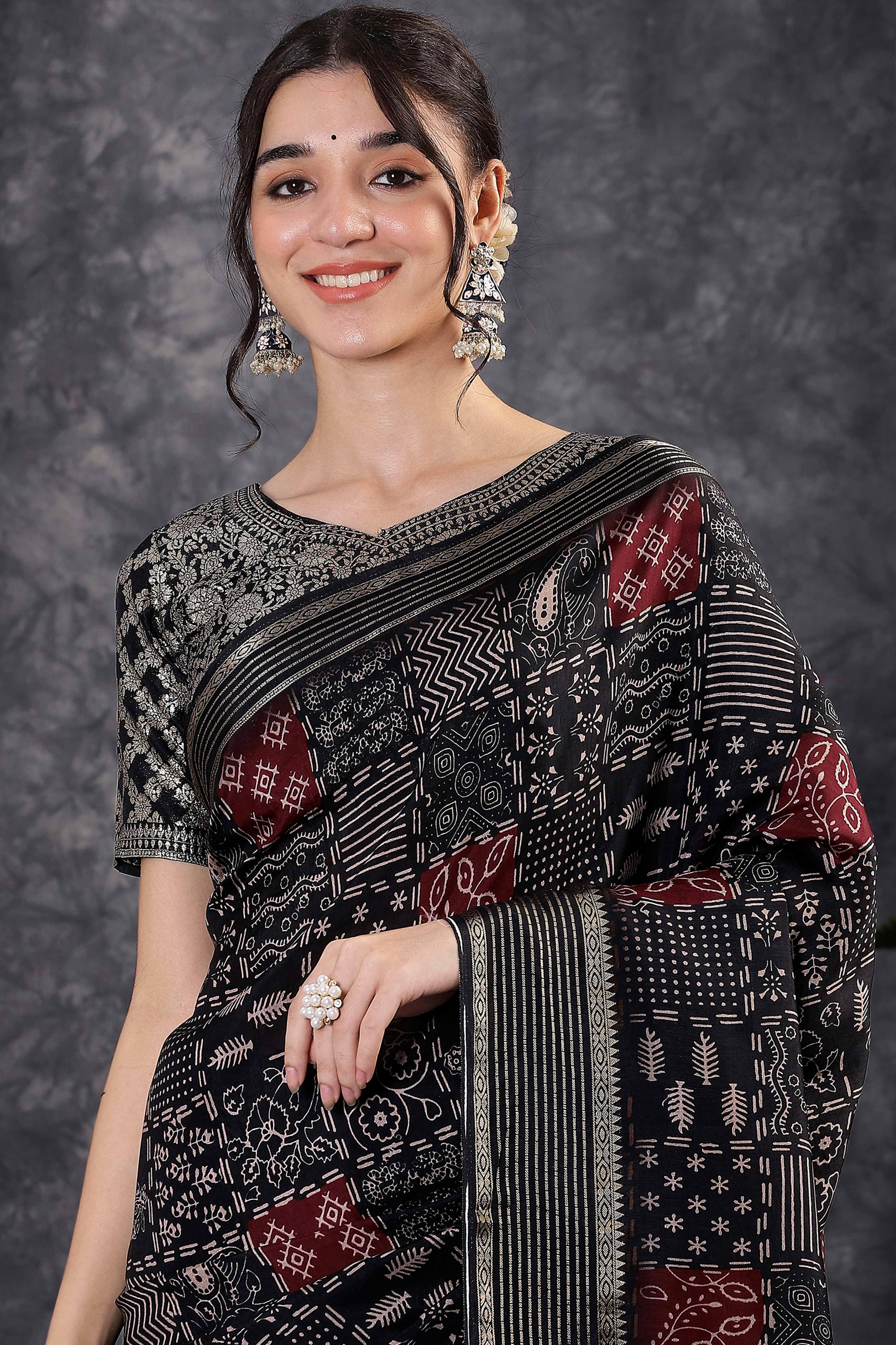 Black Dola Silk Saree Featuring Abstract Print & Jacquard Border