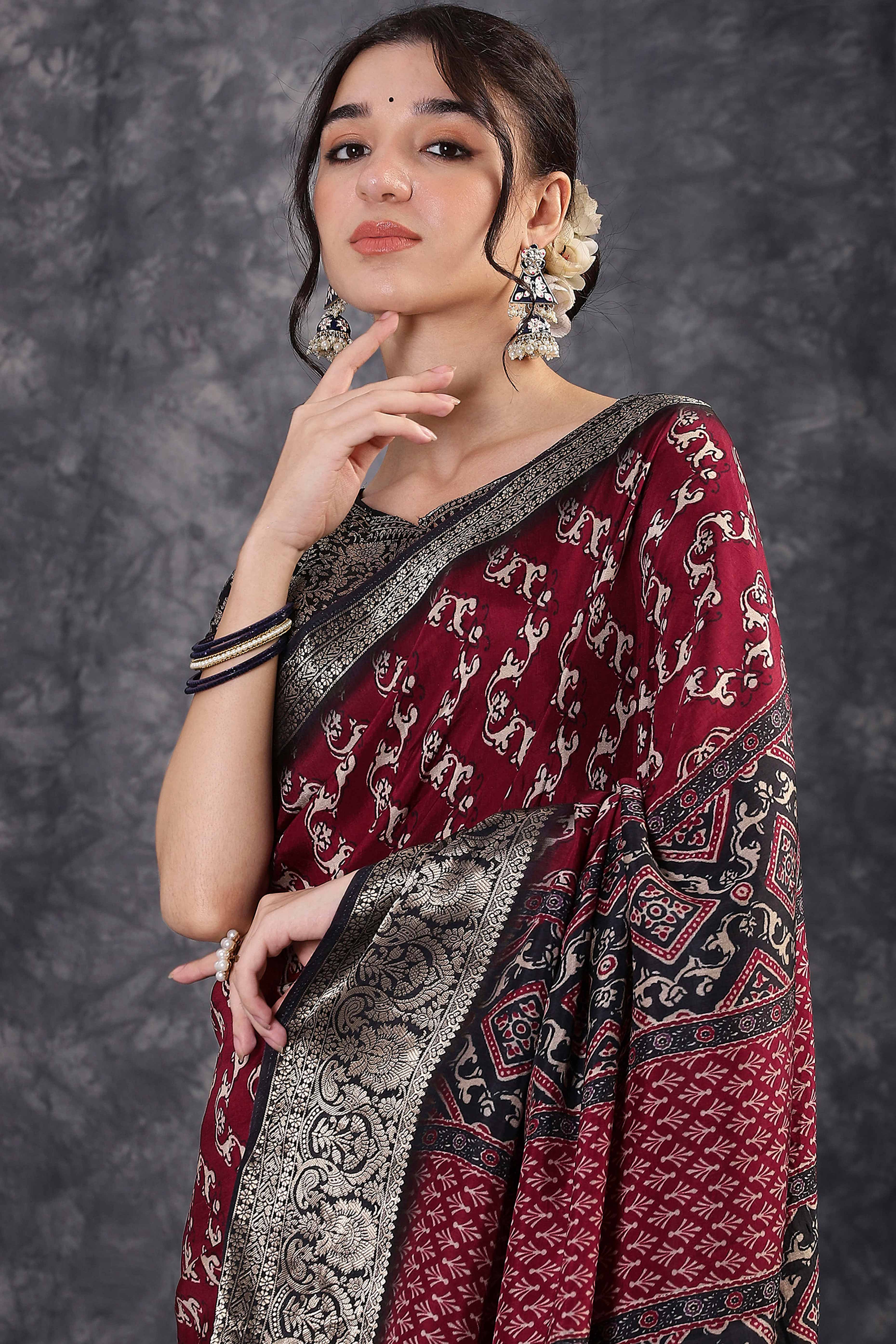Maroon Dola Silk Saree Featuring Abstract Print & Jacquard Border