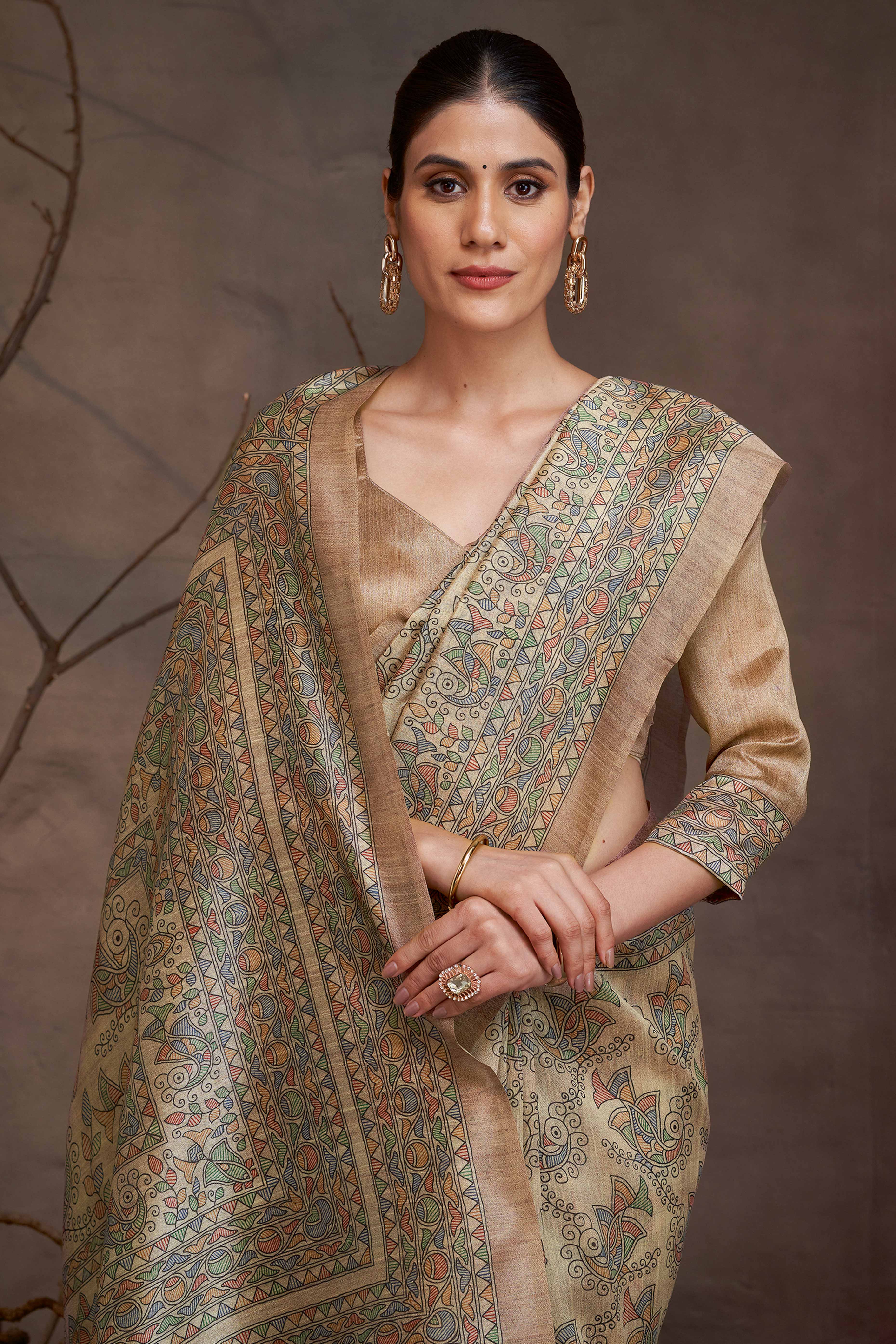 Timeless Beige Saree with Ethnic Madhubani Floral Art