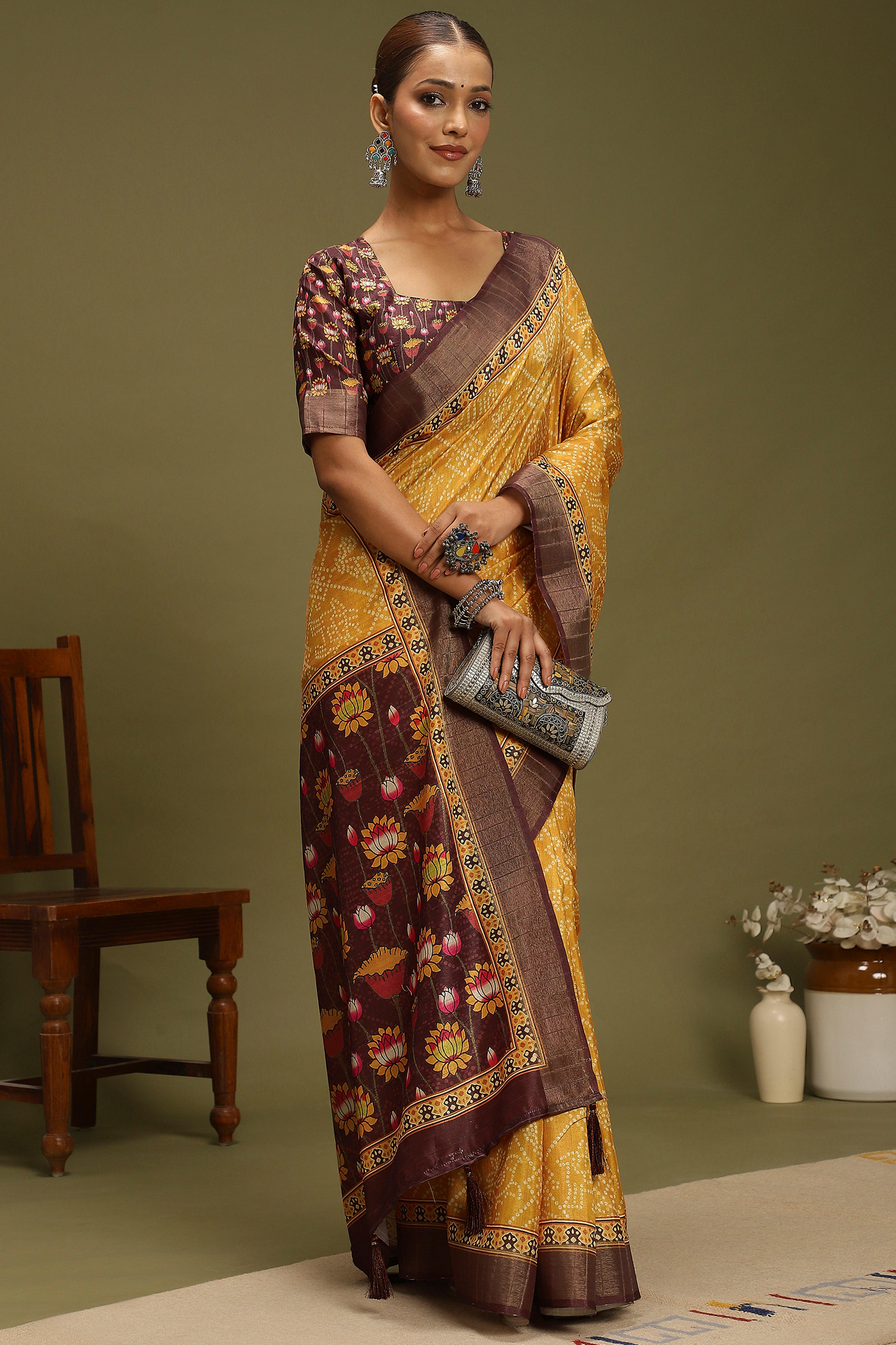 Yellow Silk Blend Saree Decorated with Vibrant Bandhani Prints and Festive Detailing