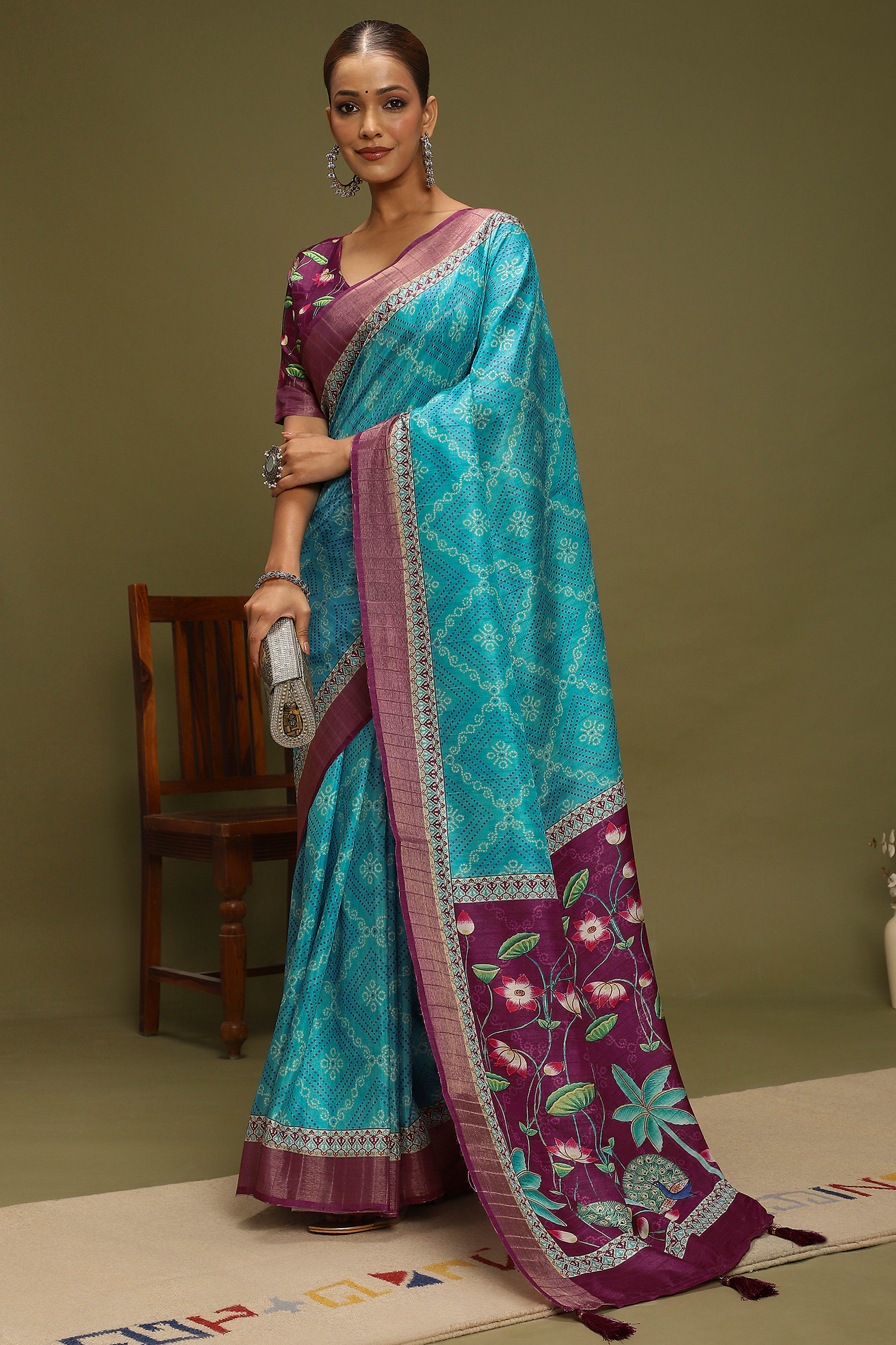 Turquoise Silk Blend Saree Decorated with Vibrant Bandhani Prints and Festive Detailing
