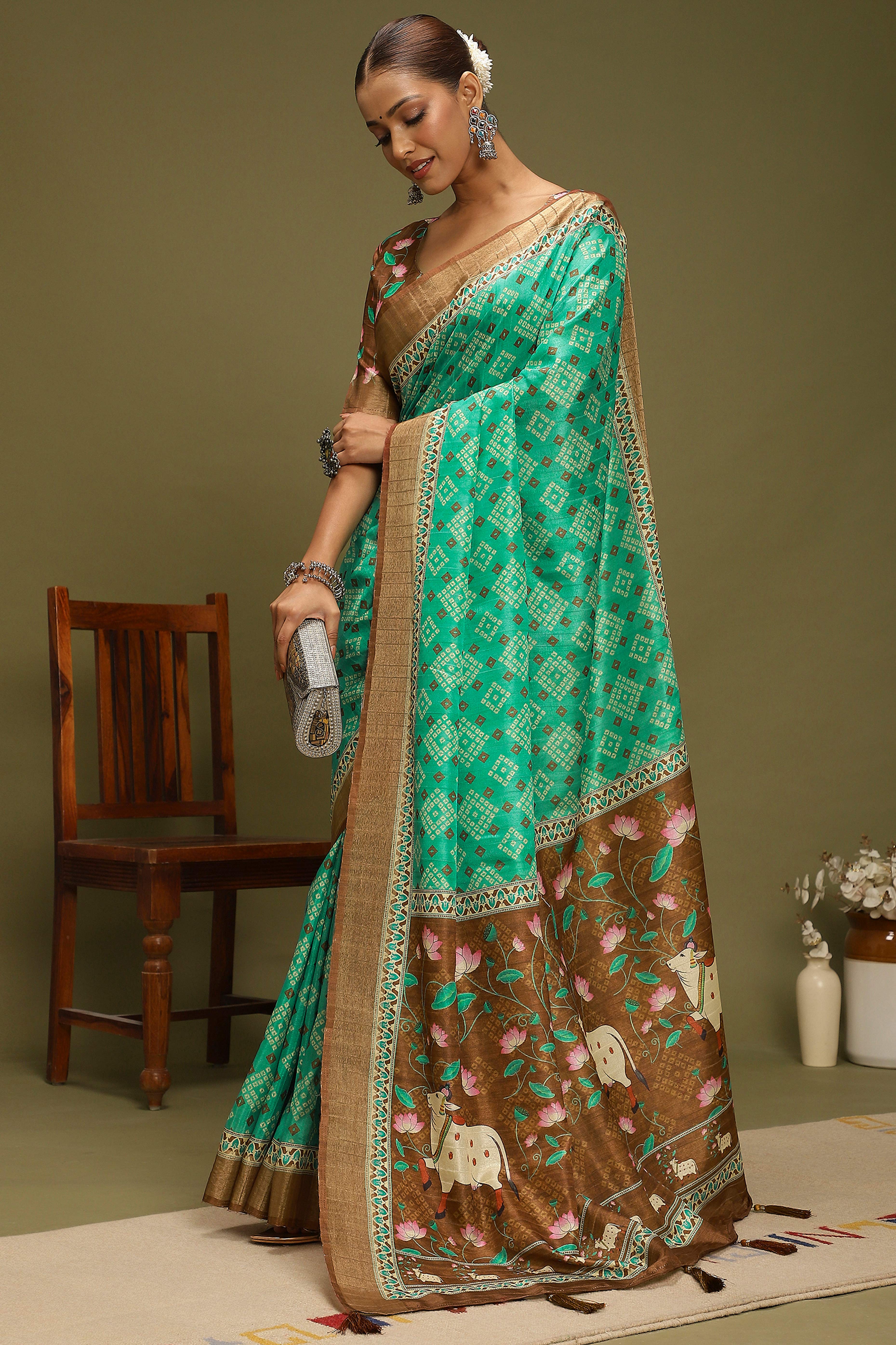 Rama Green Silk Blend Saree Decorated with Vibrant Bandhani Prints and Festive Detailing