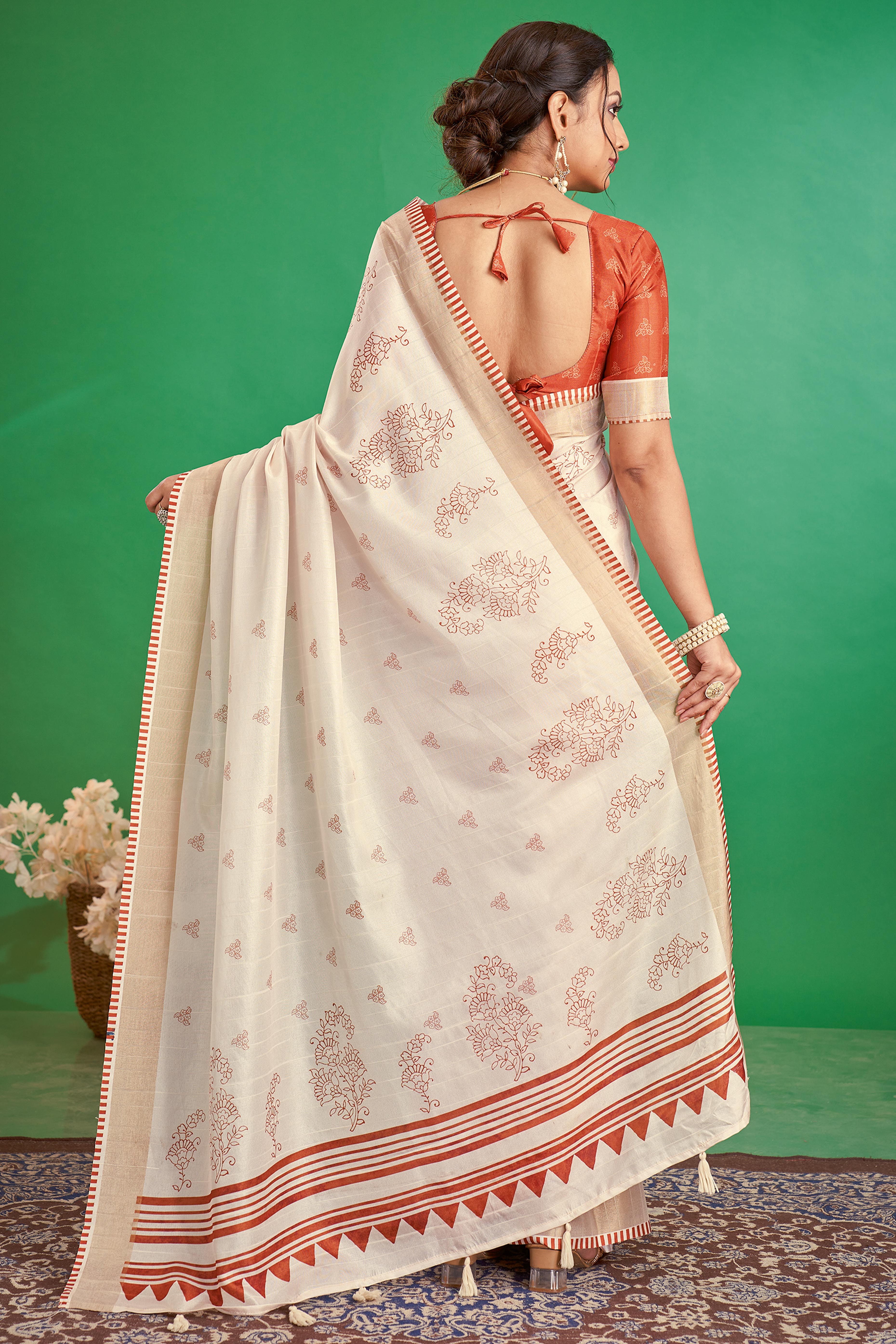 Charming Offwhite & Rust Floral Printed Kotha Cotton Silk Saree Adorned With Graceful Tassel Pallu