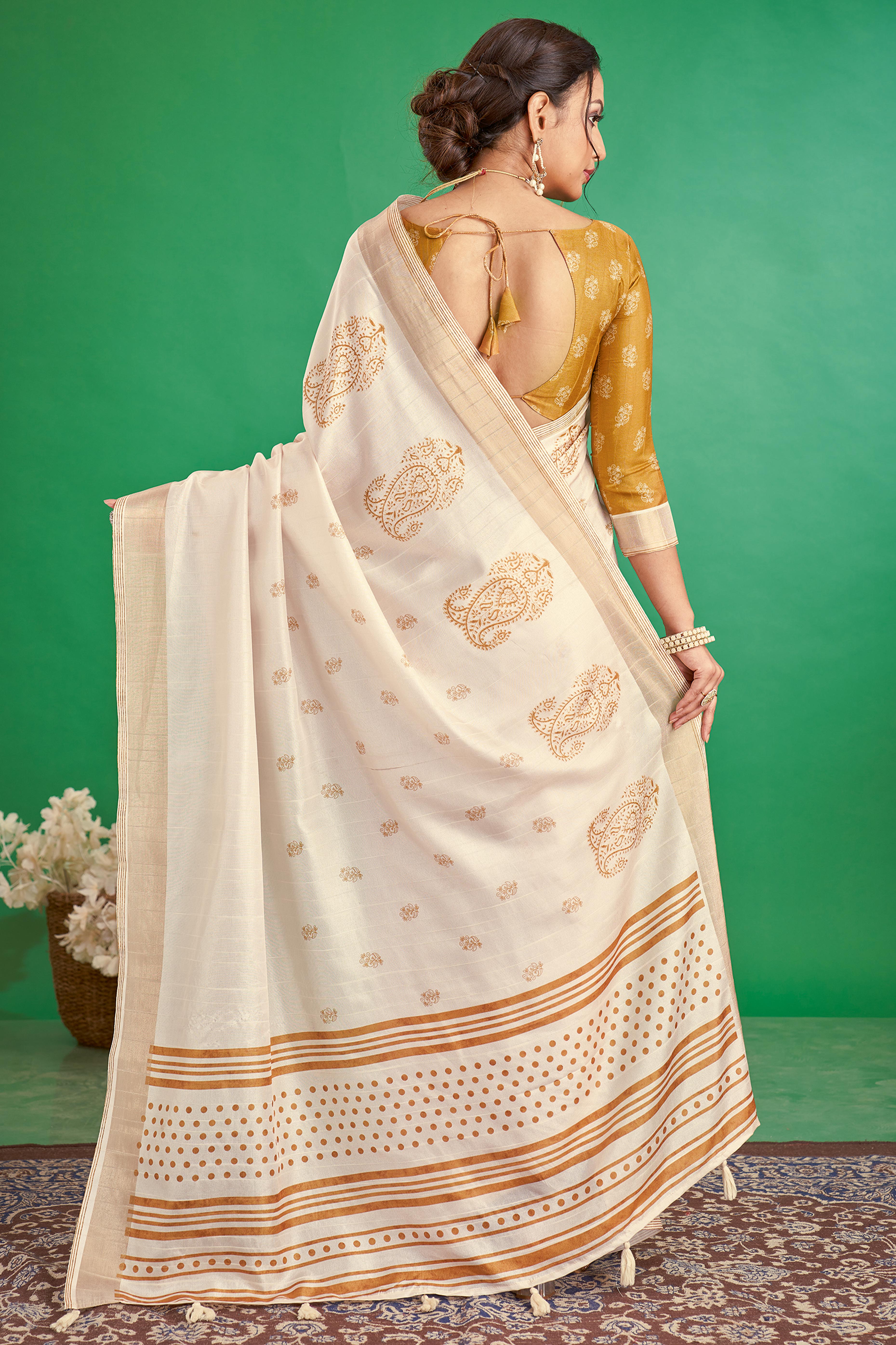 Charming Offwhite & Mustard Floral Printed Kotha Cotton Silk Saree Adorned With Tassel Pallu