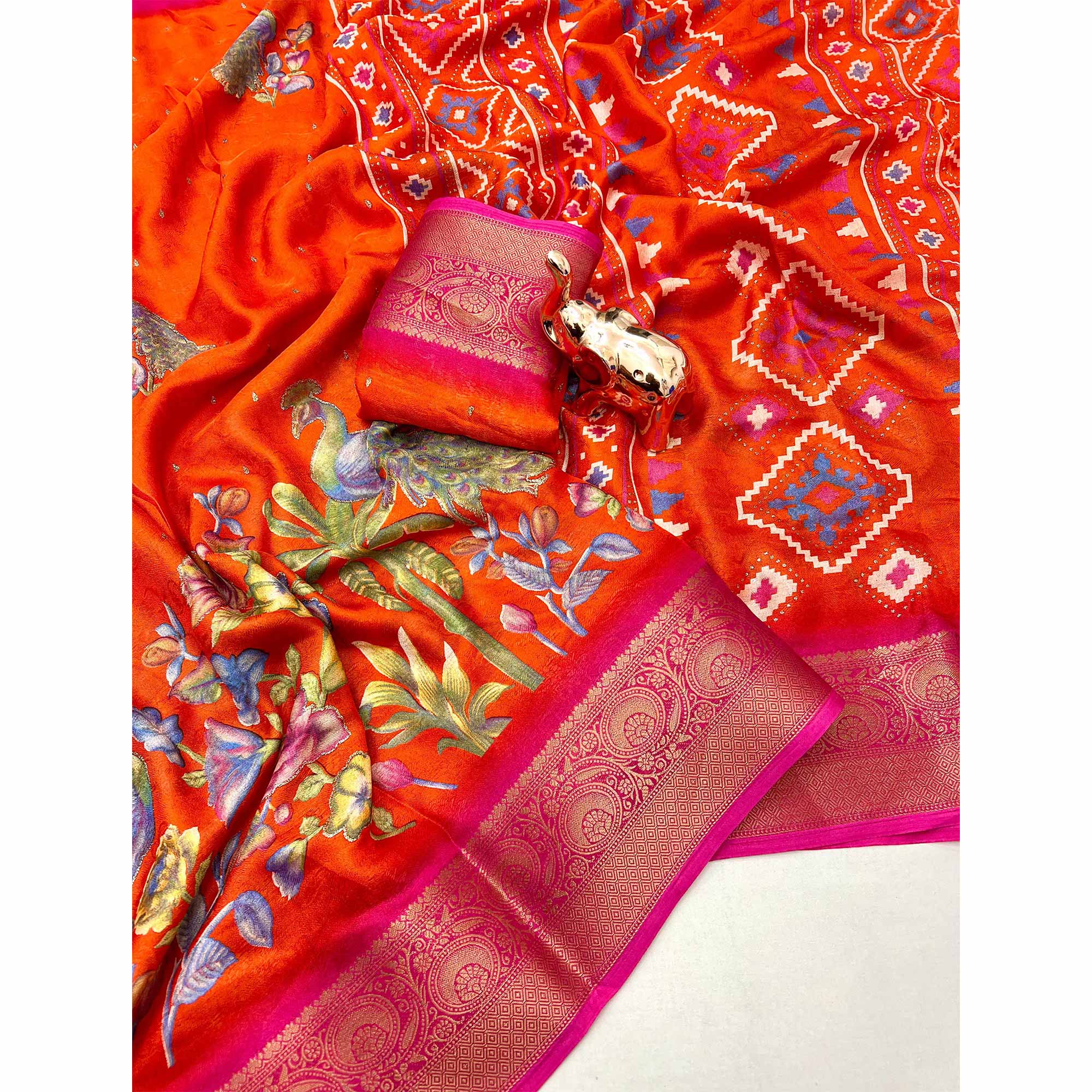 Elegant Orange Peacock & Floral Printed Georgette Saree Accented With Gleaming Weaving Zari Border
