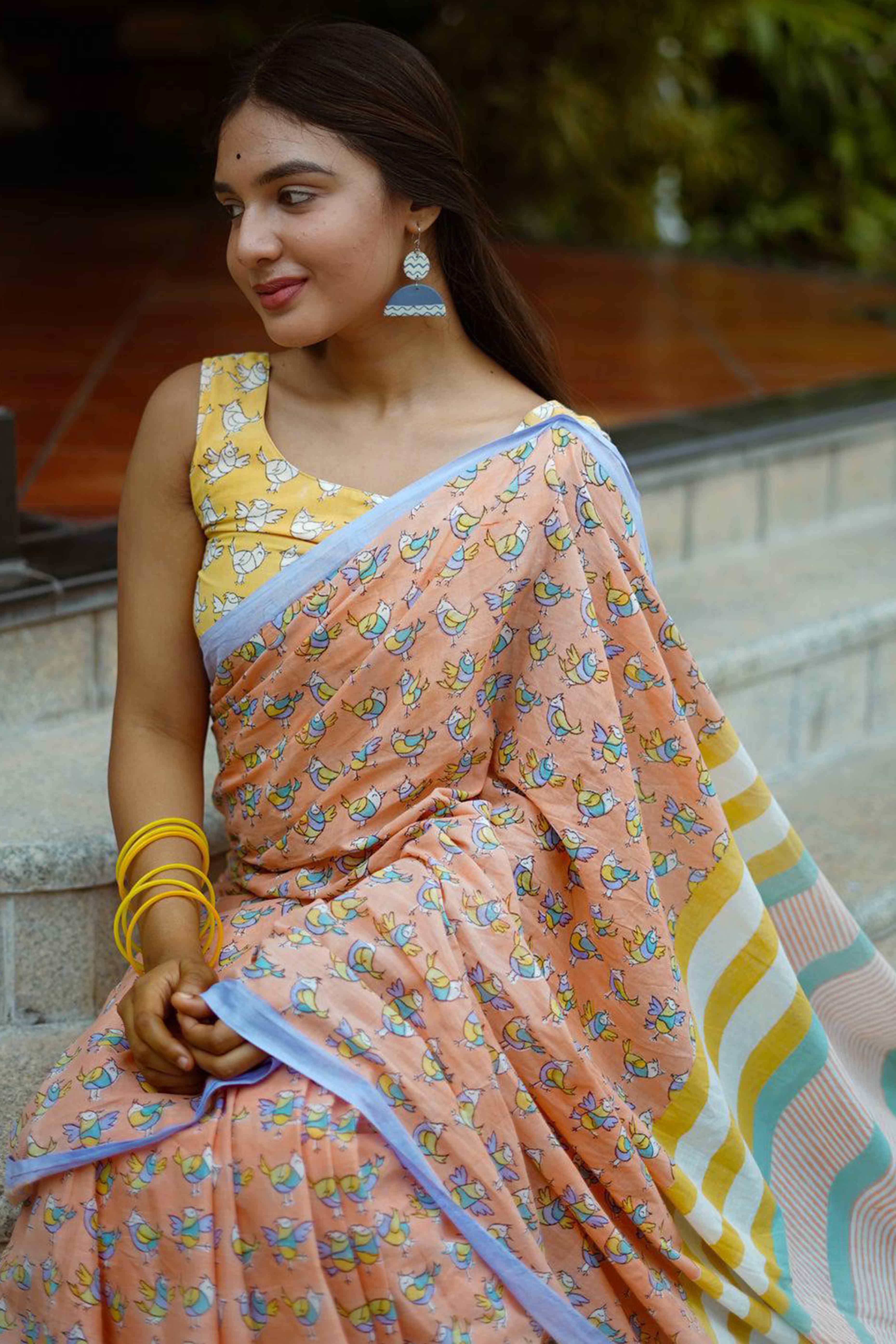 Light Orange Batik Printed Pure Linen Saree With Tassels