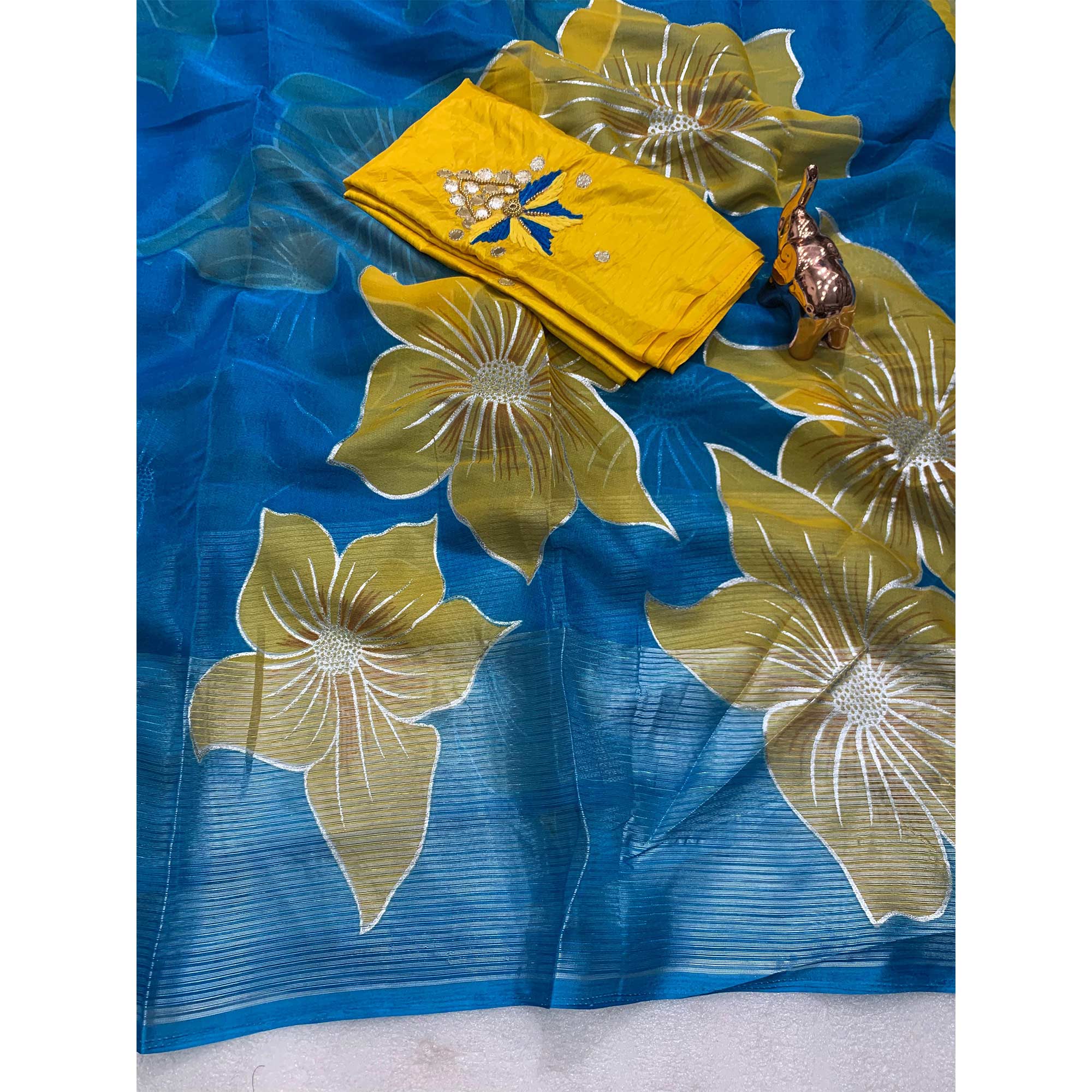 Blue and Yellow Organza Saree with Exquisite Floral Foil Motifs
