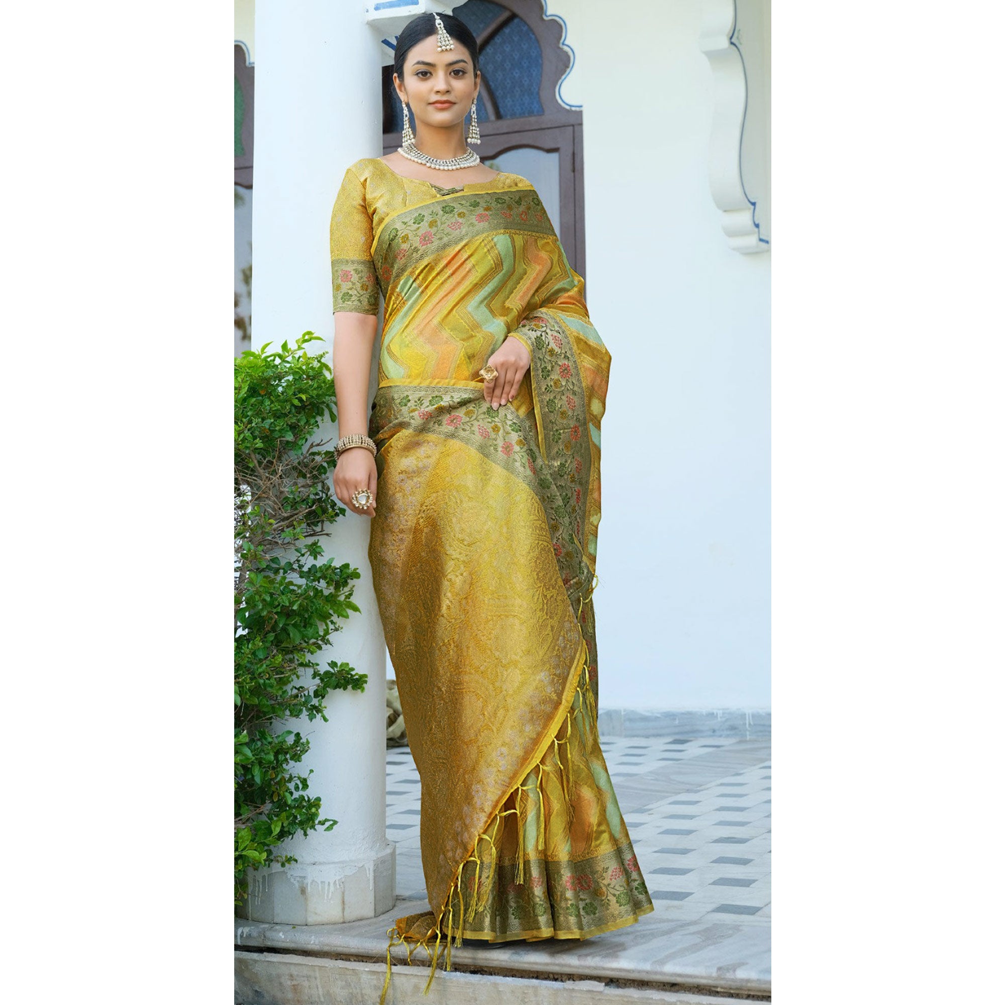 Yellow Woven Organza Saree With Tassels