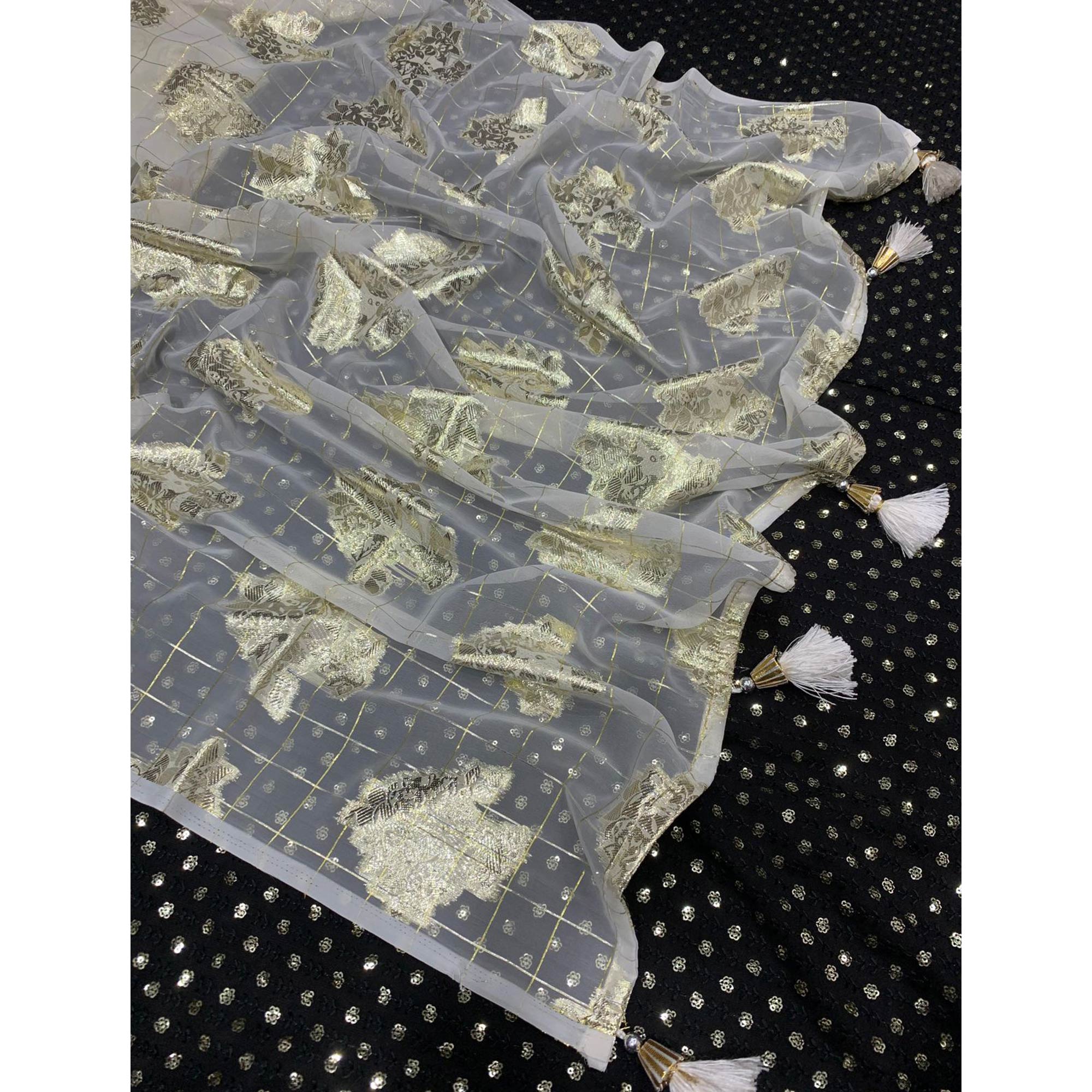 White Floral Woven Georgette Saree With Tassels