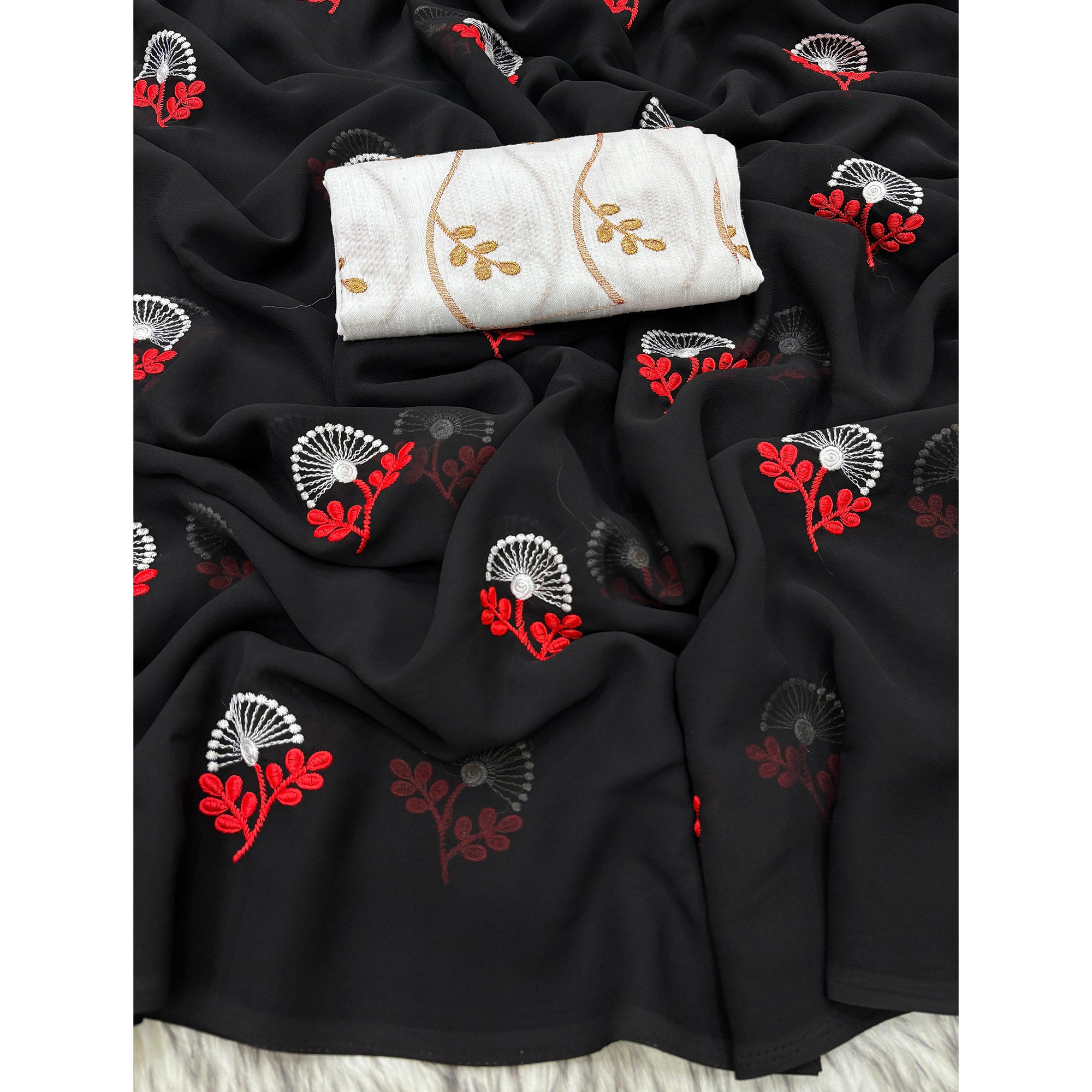 Black Floral Embroidered Georgette Saree With Tassels