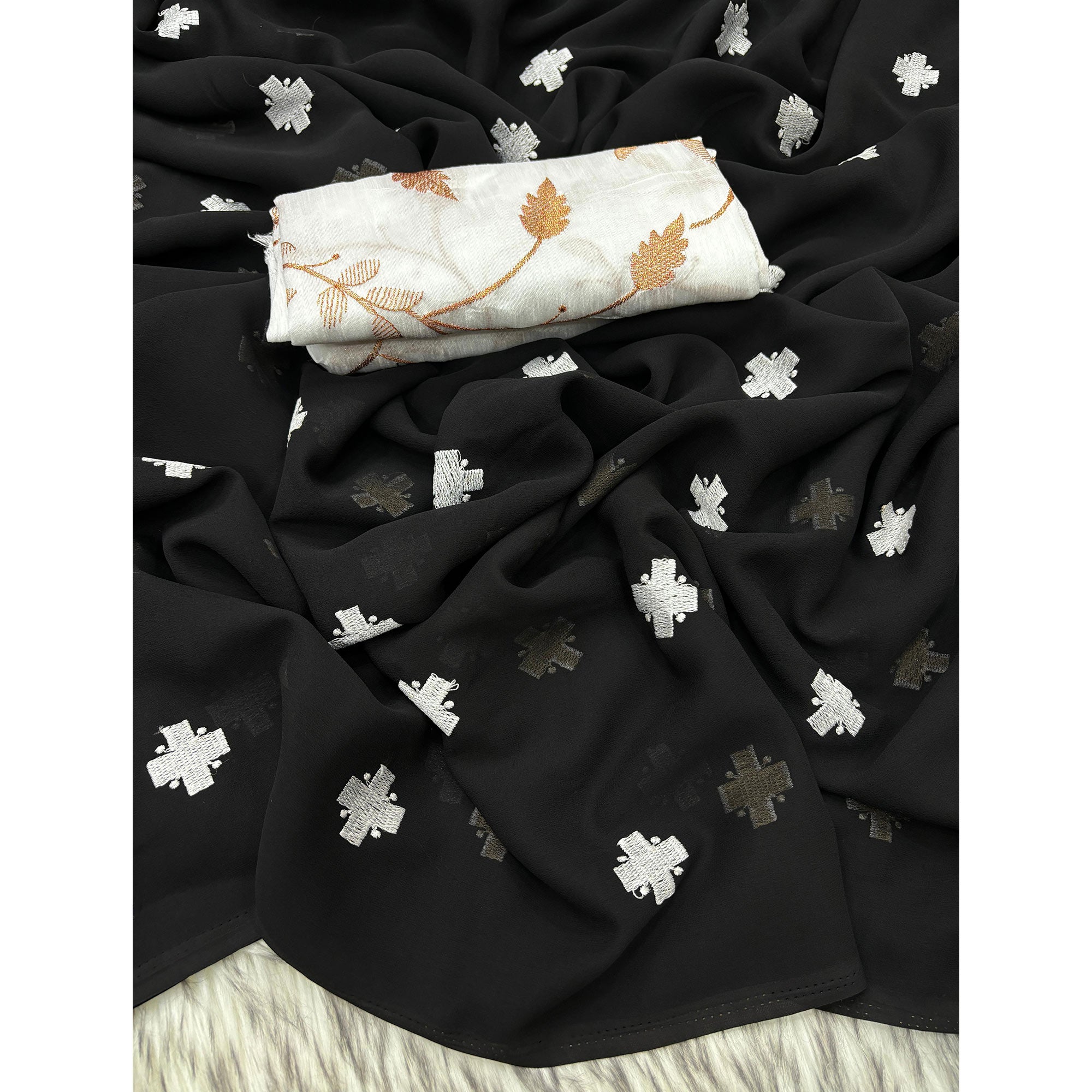 Black Embroidered Georgette Saree With Tassels