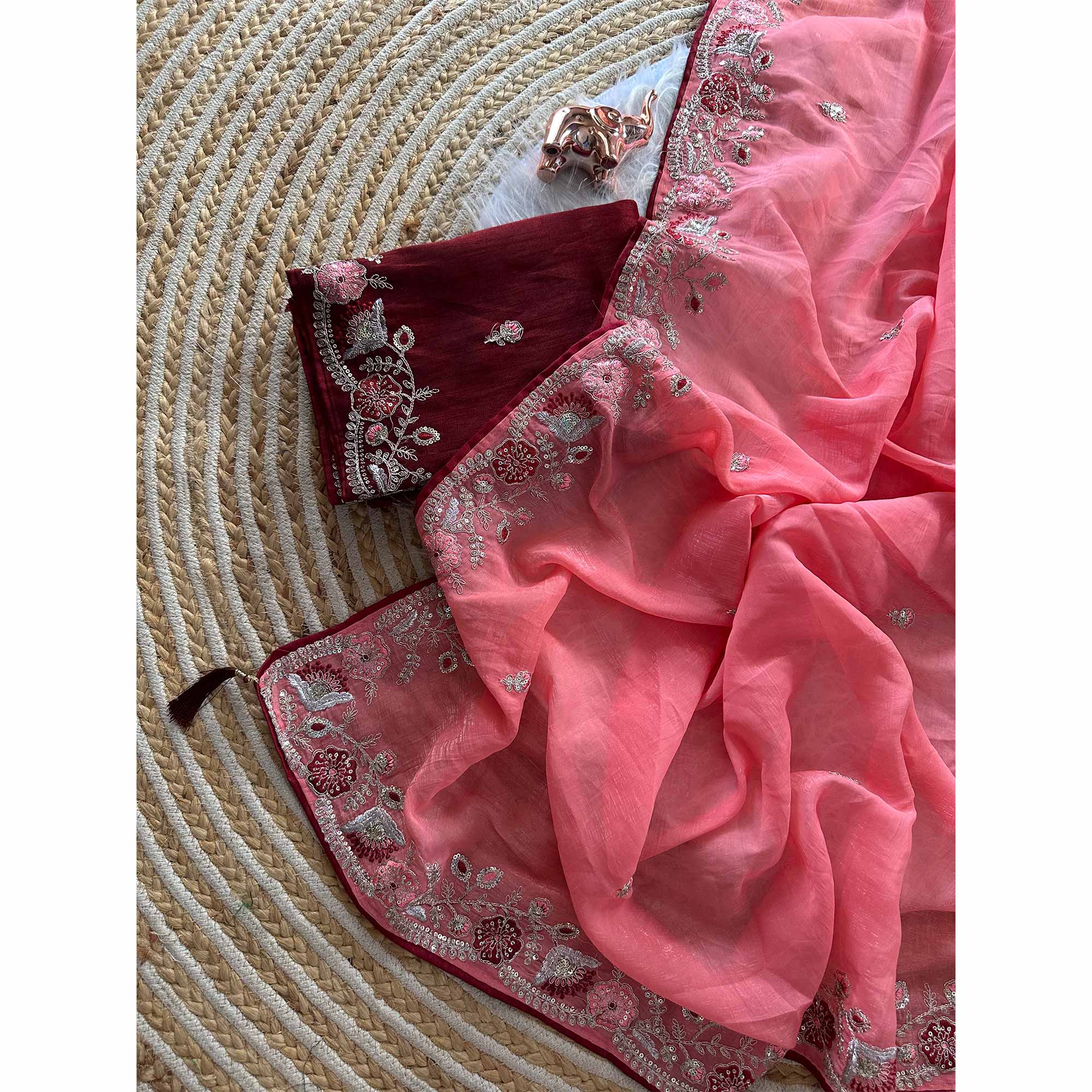 Peach Pure Silk Saree Showcasing Floral Sequins Embroidery With A Decorative Tassel Pallu