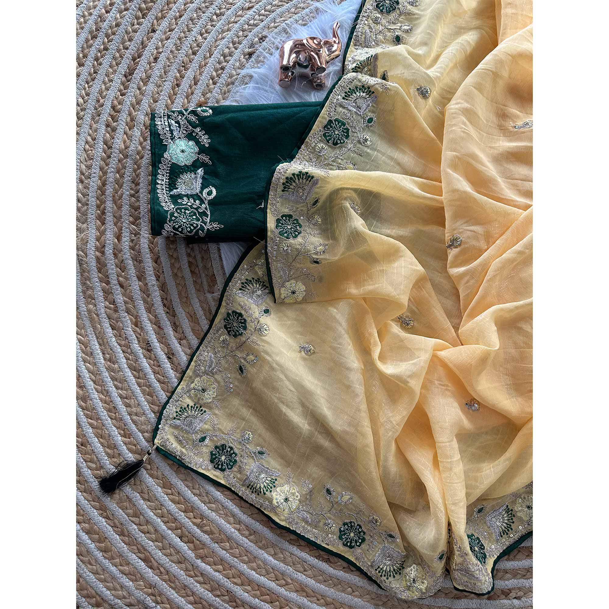 Yellow Pure Silk Saree Showcasing Floral Sequins Embroidery With A Decorative Tassel Pallu