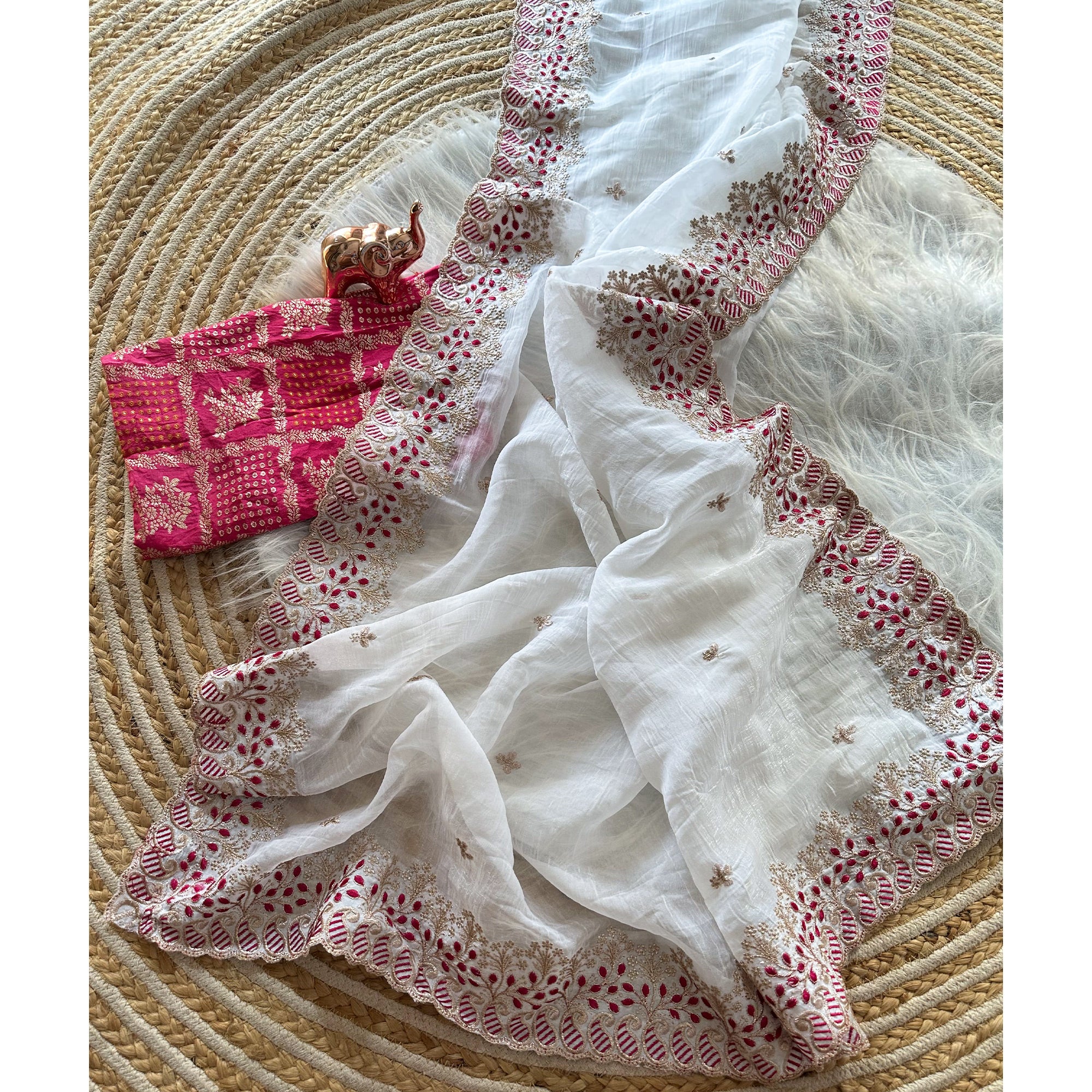 White Paper Crush Pure Silk Saree Featuring Intricate Floral Embroidery Craftsmanship