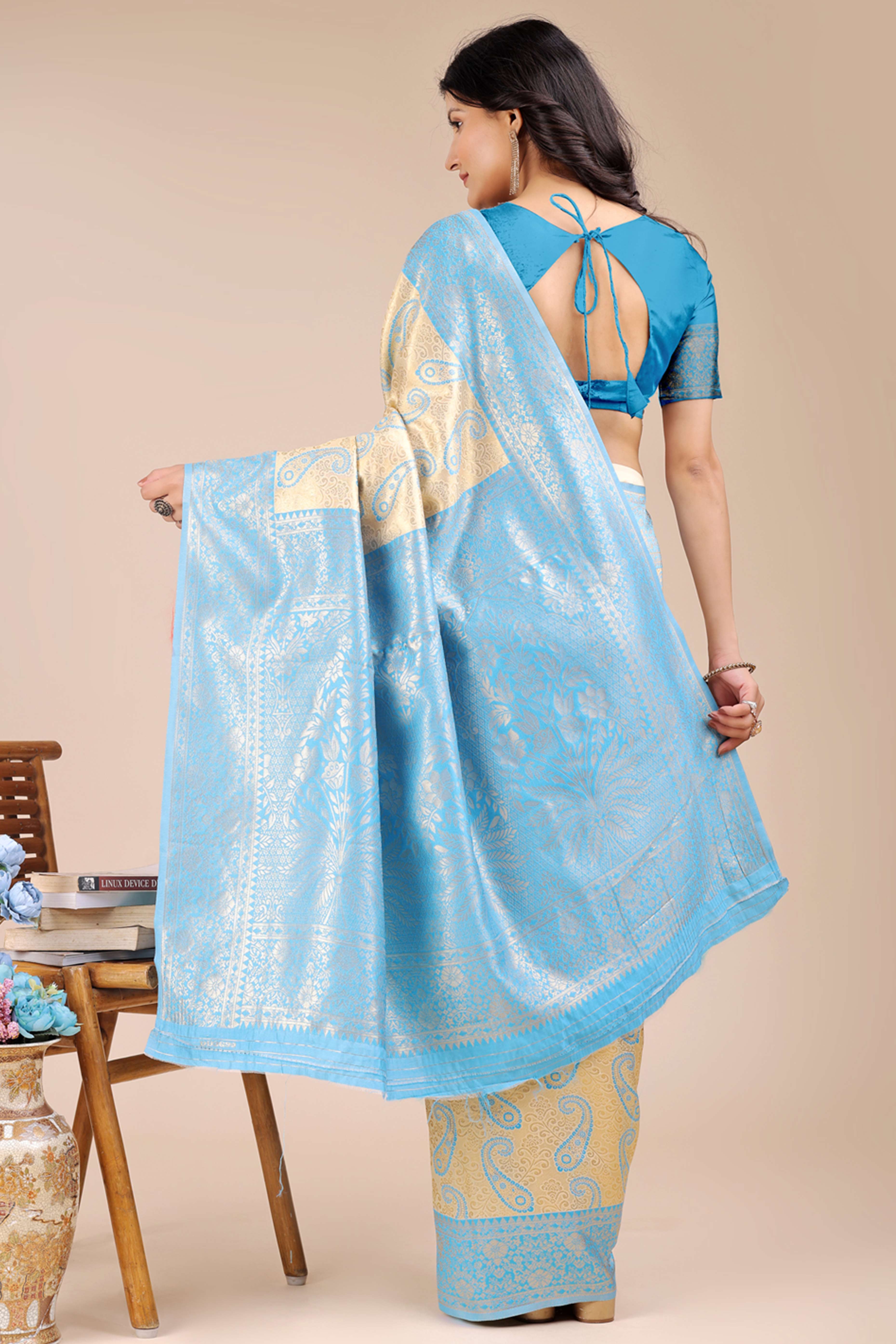 Cream Banarasi Silk Saree Featuring Sky Blue Floral Zari Weaving and a Rich Contrast Border
