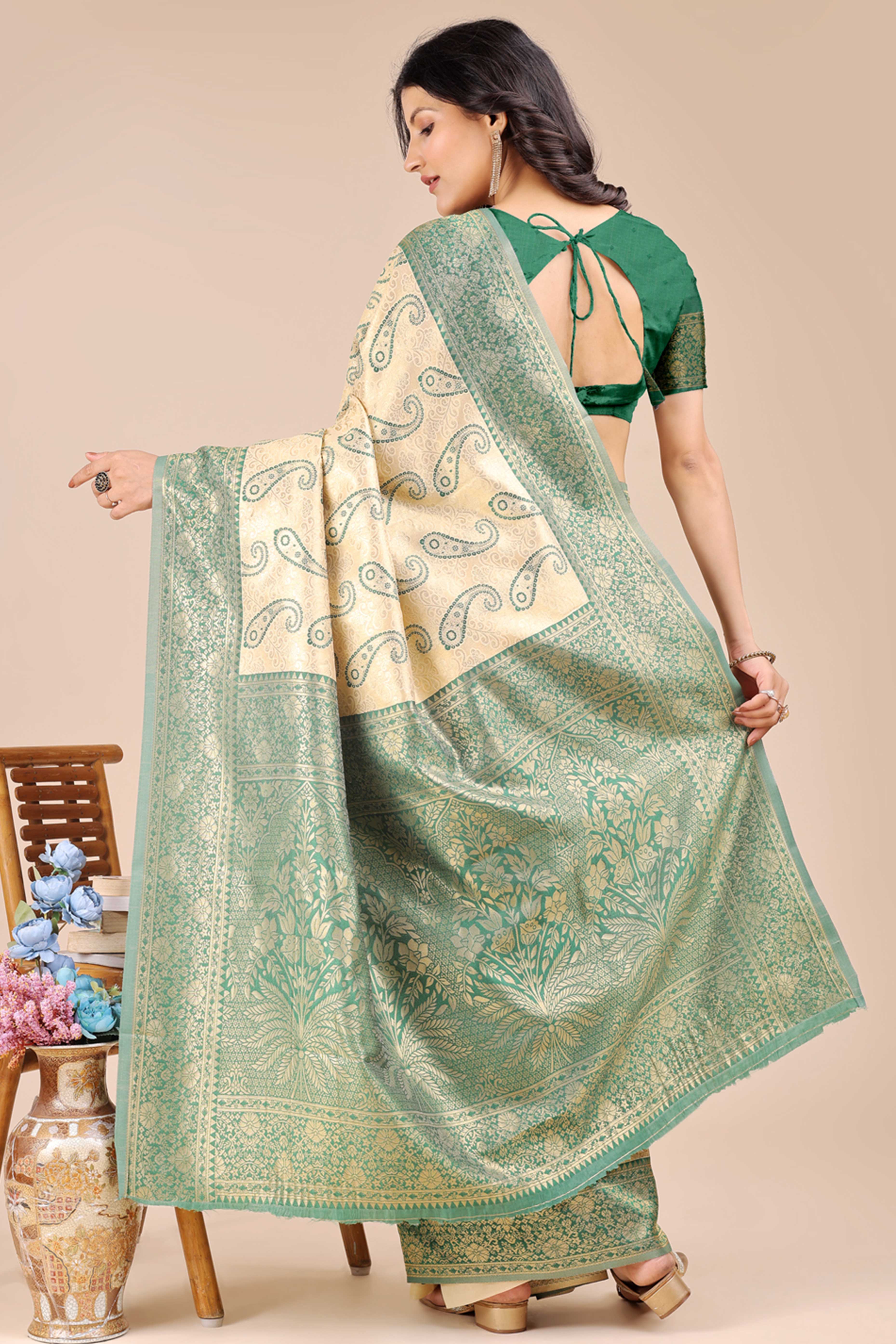 Cream Banarasi Silk Saree Featuring Green Floral Zari Weaving and a Rich Contrast Border